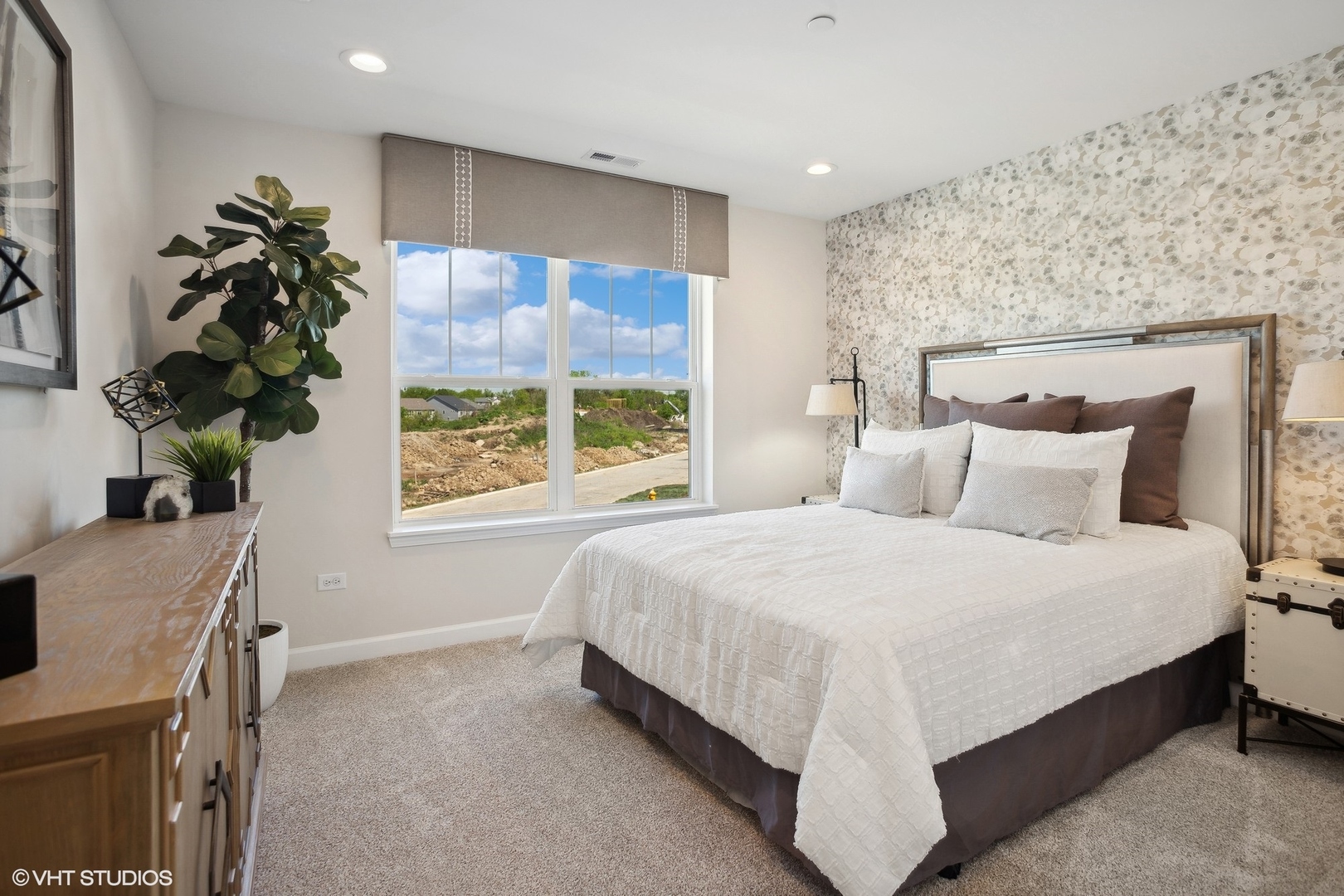 327 Masters Drive Addison, IL 60101 - Photo 12 of 16 a large bed sitting in a bedroom next to a window