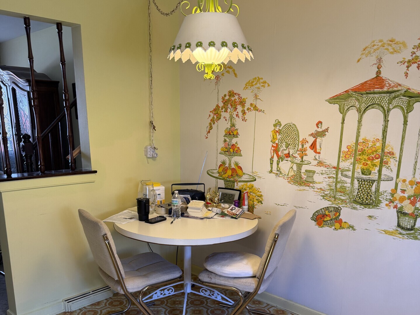 9037 Chester Avenue Niles, IL 60714 - Photo 7 of 12 a view of a dining room with furniture and chandelier