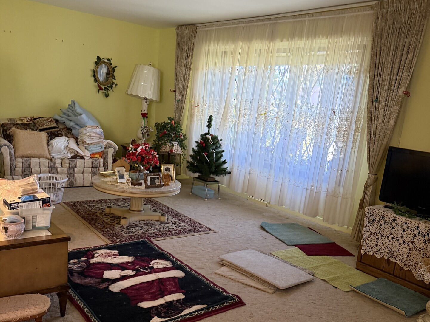 9037 Chester Avenue Niles, IL 60714 - Photo 8 of 12 a room with furniture and a flat screen tv