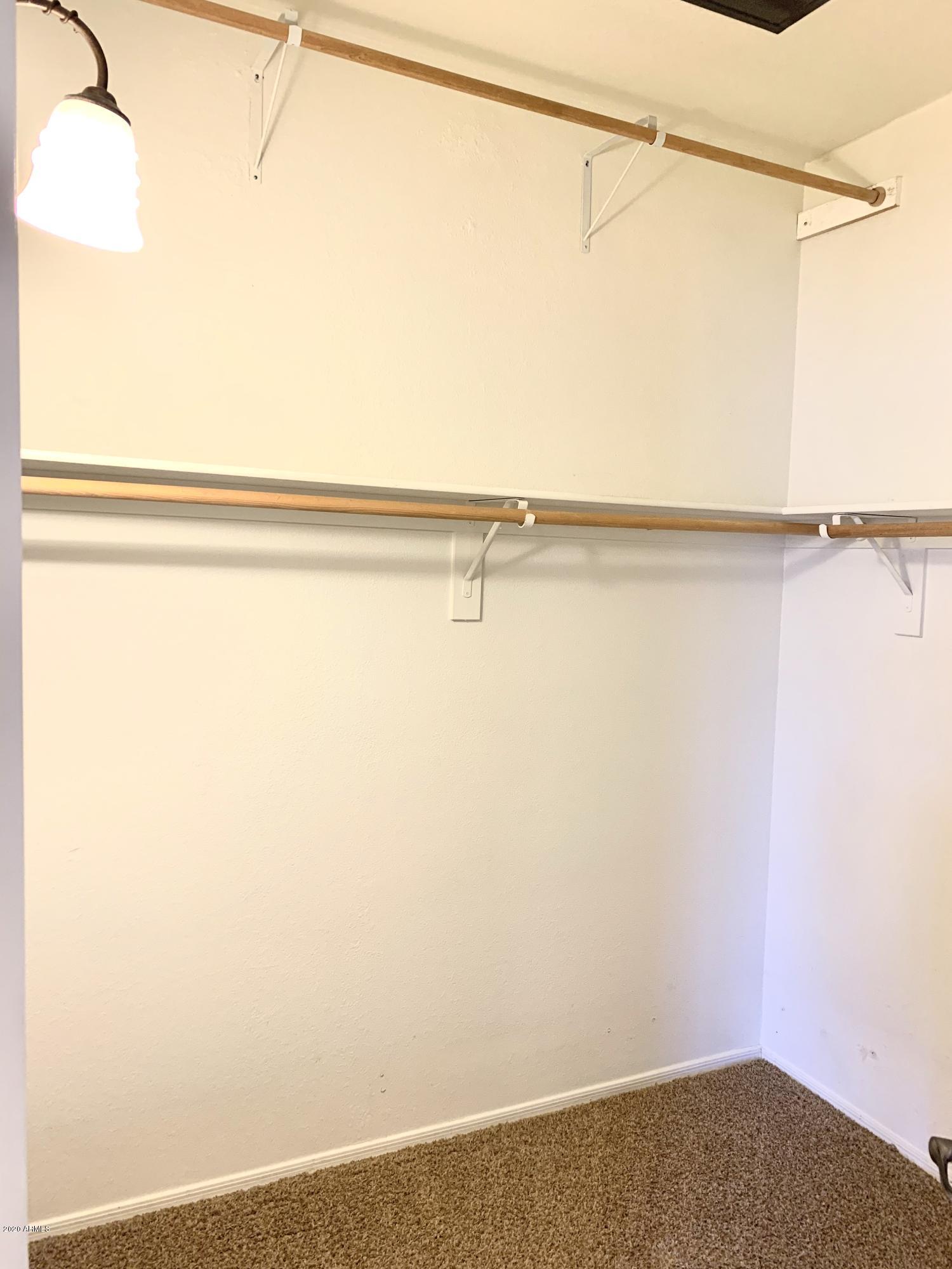 3150 East Beardsley Road, Unit 1017 Phoenix, AZ 85050 - Photo 14 of 27 Walk-in Closet