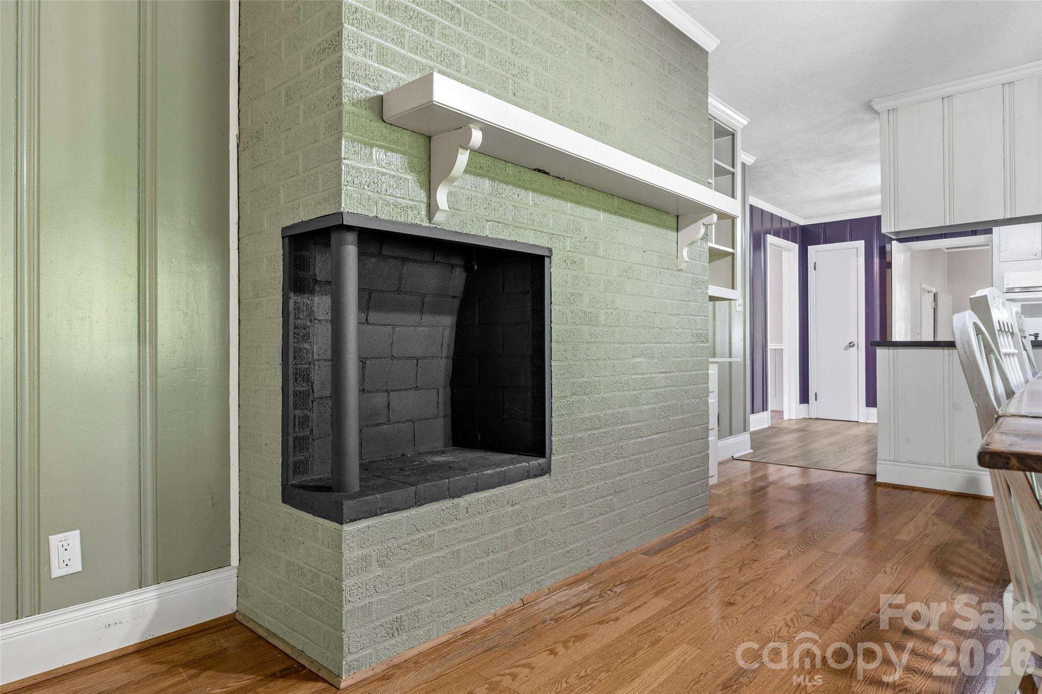 407 Pine Street Fort Mill, SC 29715 - Photo 19 of 45 a view of a hallway with wooden floor and stairs
