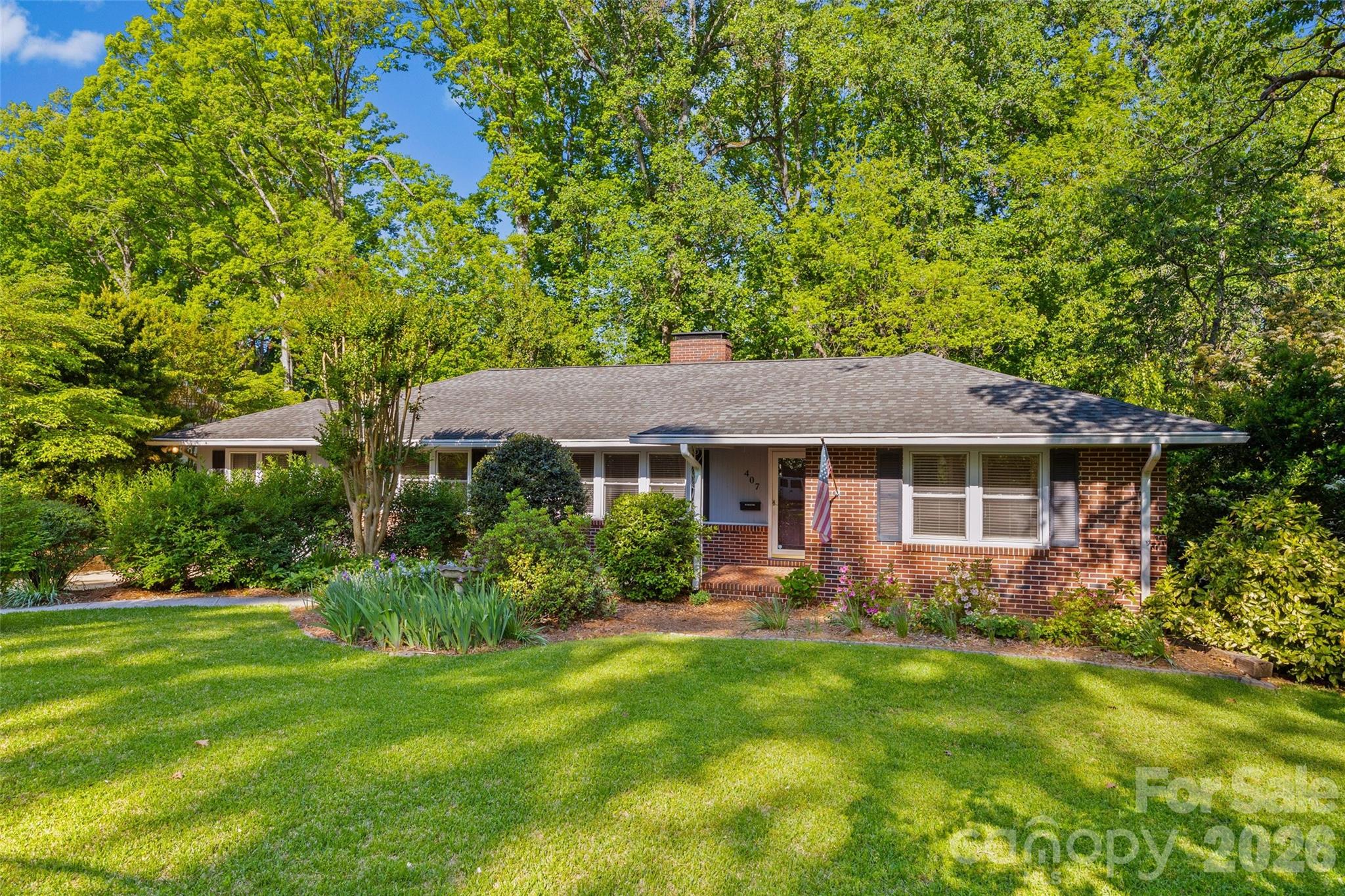 407 Pine Street Fort Mill, SC 29715 - Photo 2 of 45 a view of a house with garden and yard