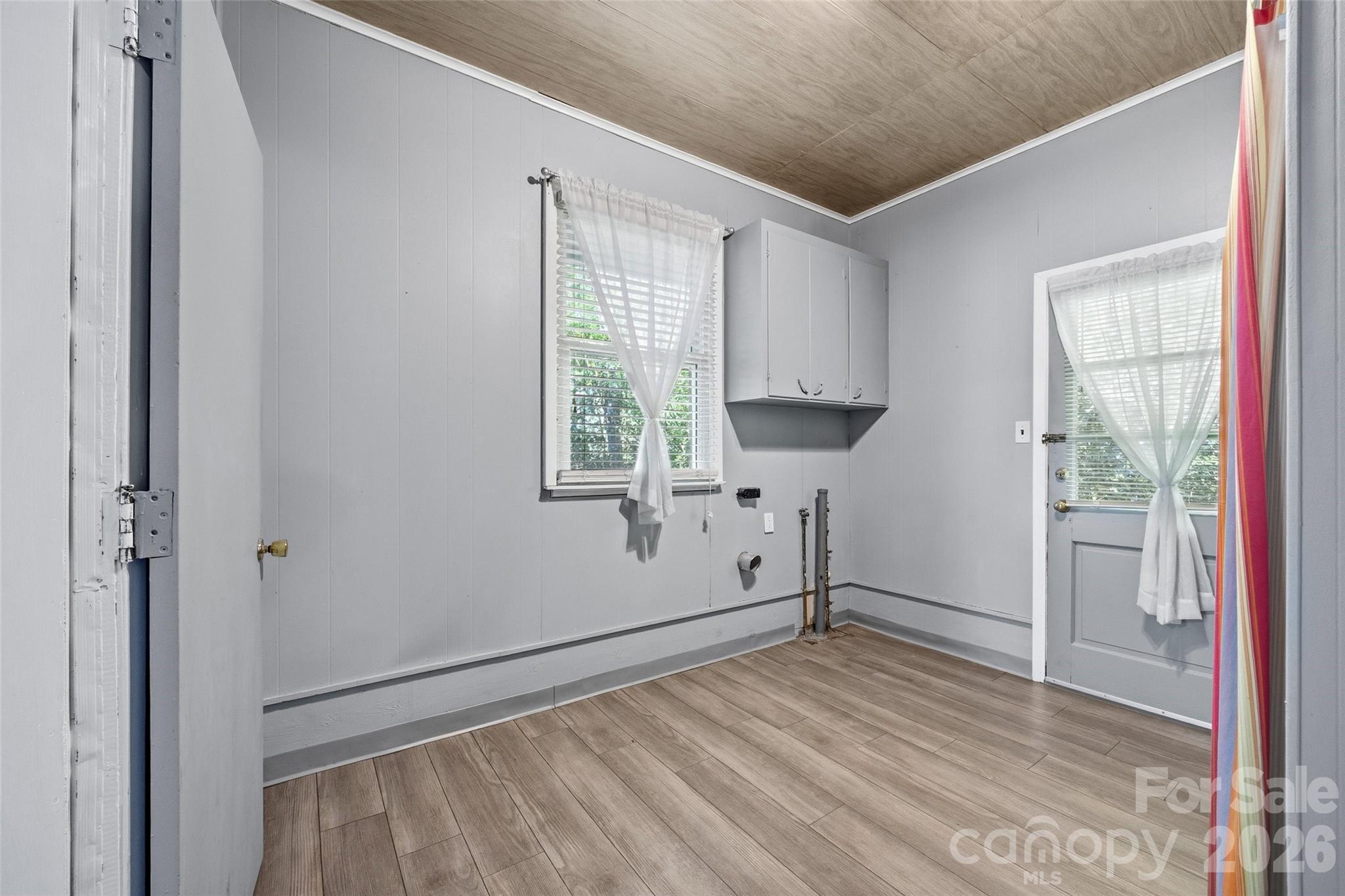 407 Pine Street Fort Mill, SC 29715 - Photo 22 of 45 a view of empty room with wooden floor and fan