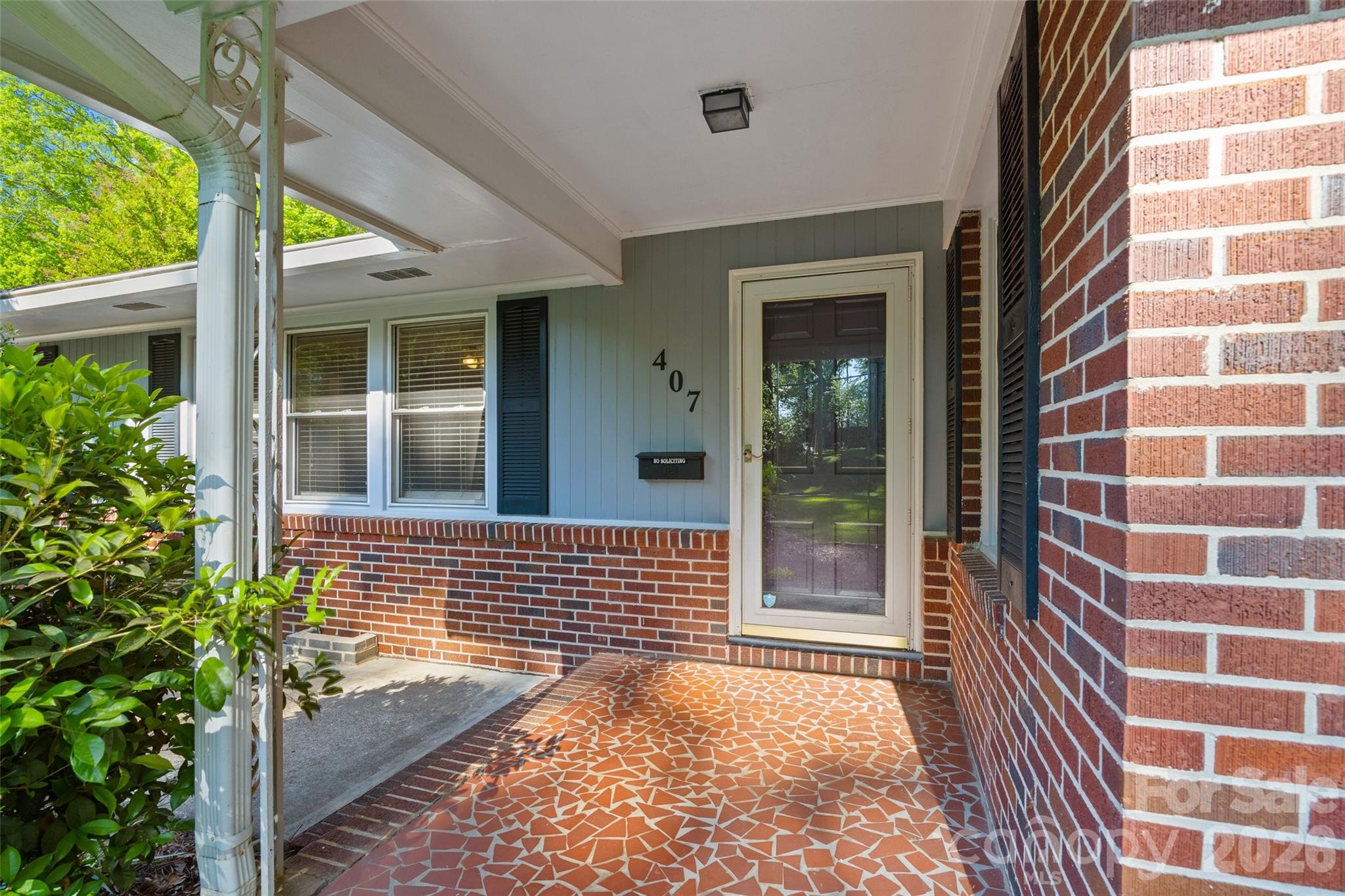 407 Pine Street Fort Mill, SC 29715 - Photo 3 of 45 a view of a brick house with a large window