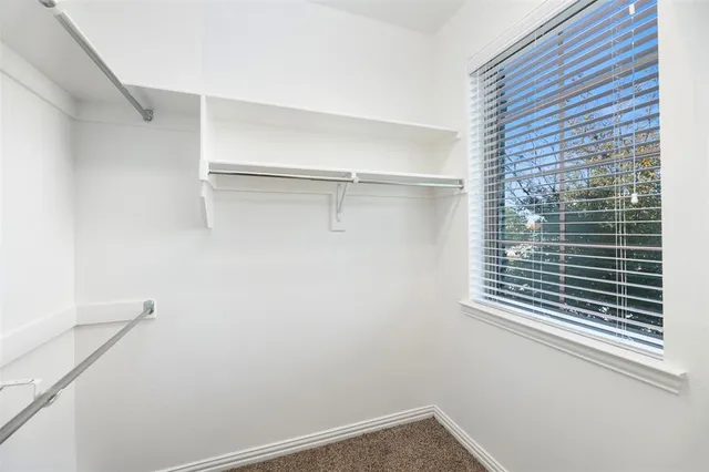 a view of a room that has a window