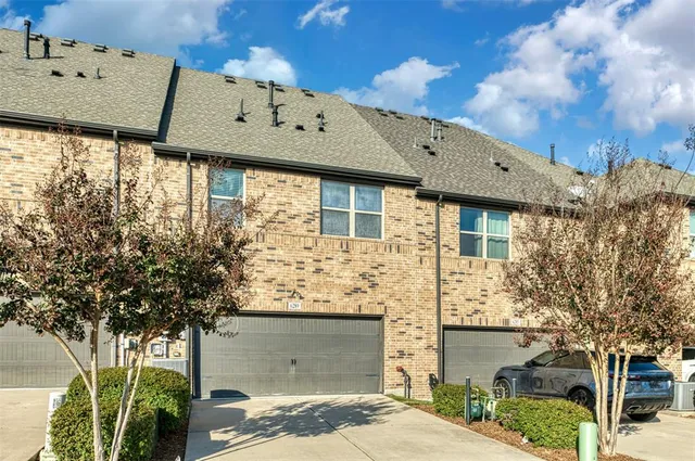 front view of a house with a street