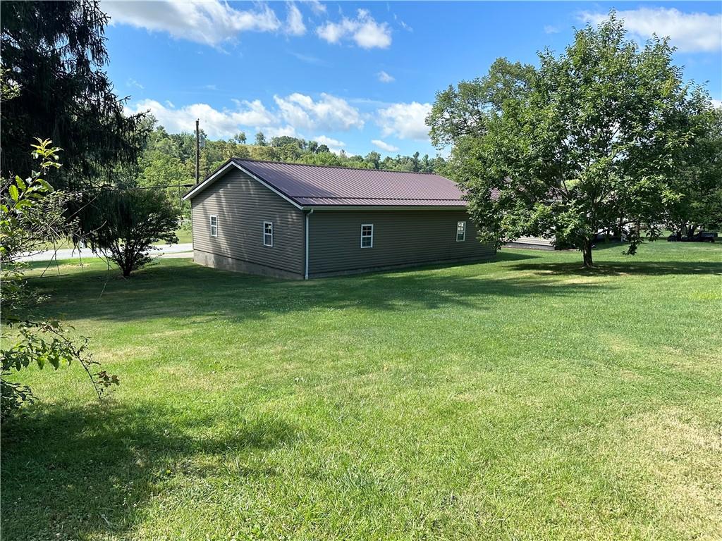 430 Joffre Cherry Valley Road Burgettstown, PA 15021 - Photo 4 of 25 a view of a house with a yard