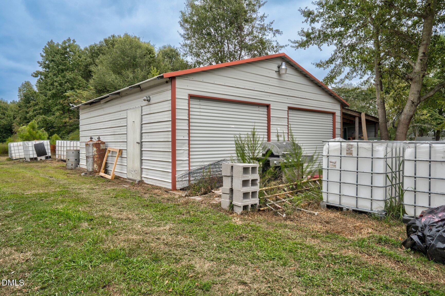 1835 Cokey Road Rocky Mount, NC 27801 - Photo 28 of 42 a view of backyard of house with outdoor seating