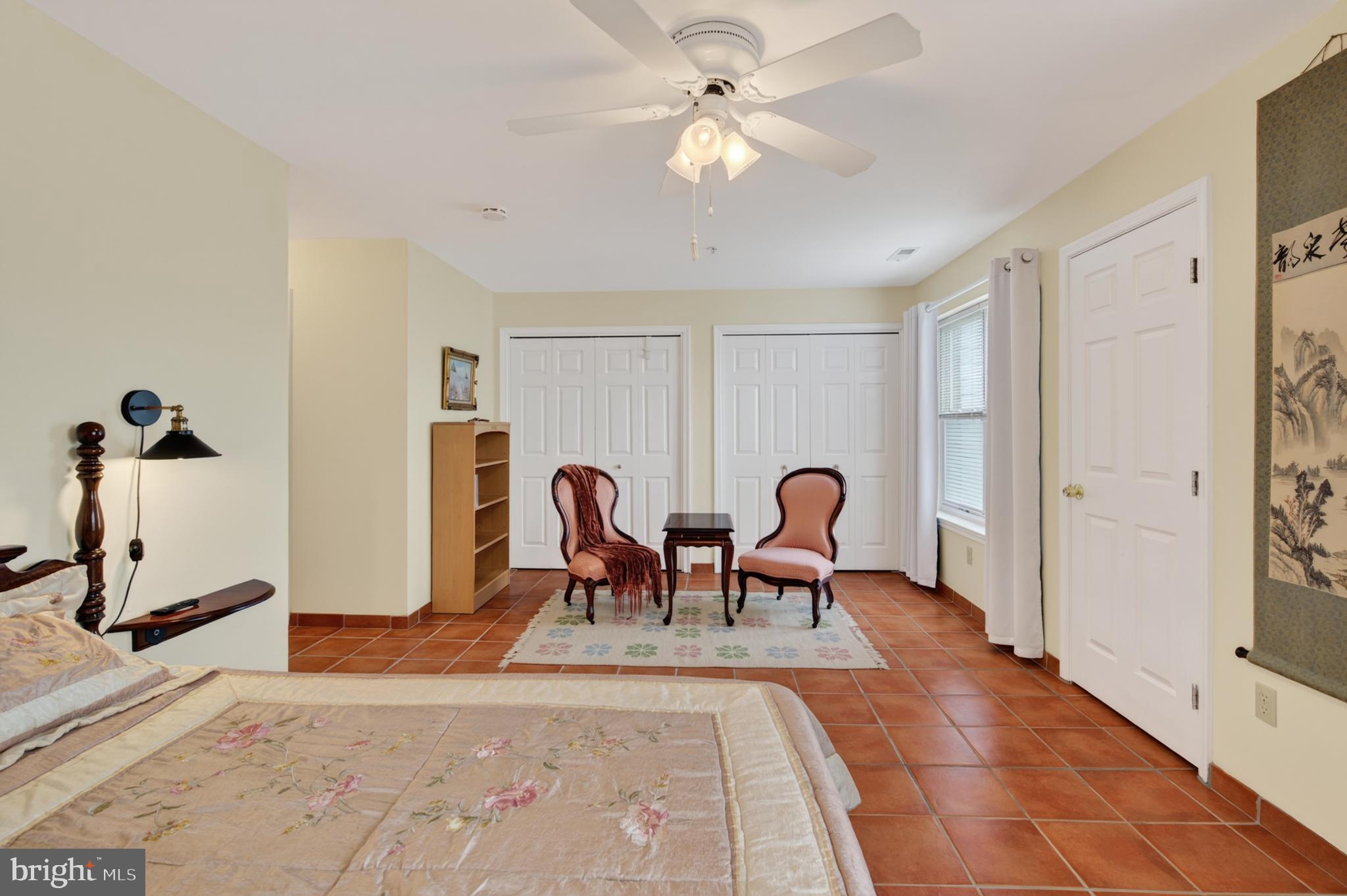 936 Bay Ridge Avenue, Unit 201 Annapolis, MD 21403 - Photo 31 of 40 a view of a livingroom with furniture and a ceiling fan