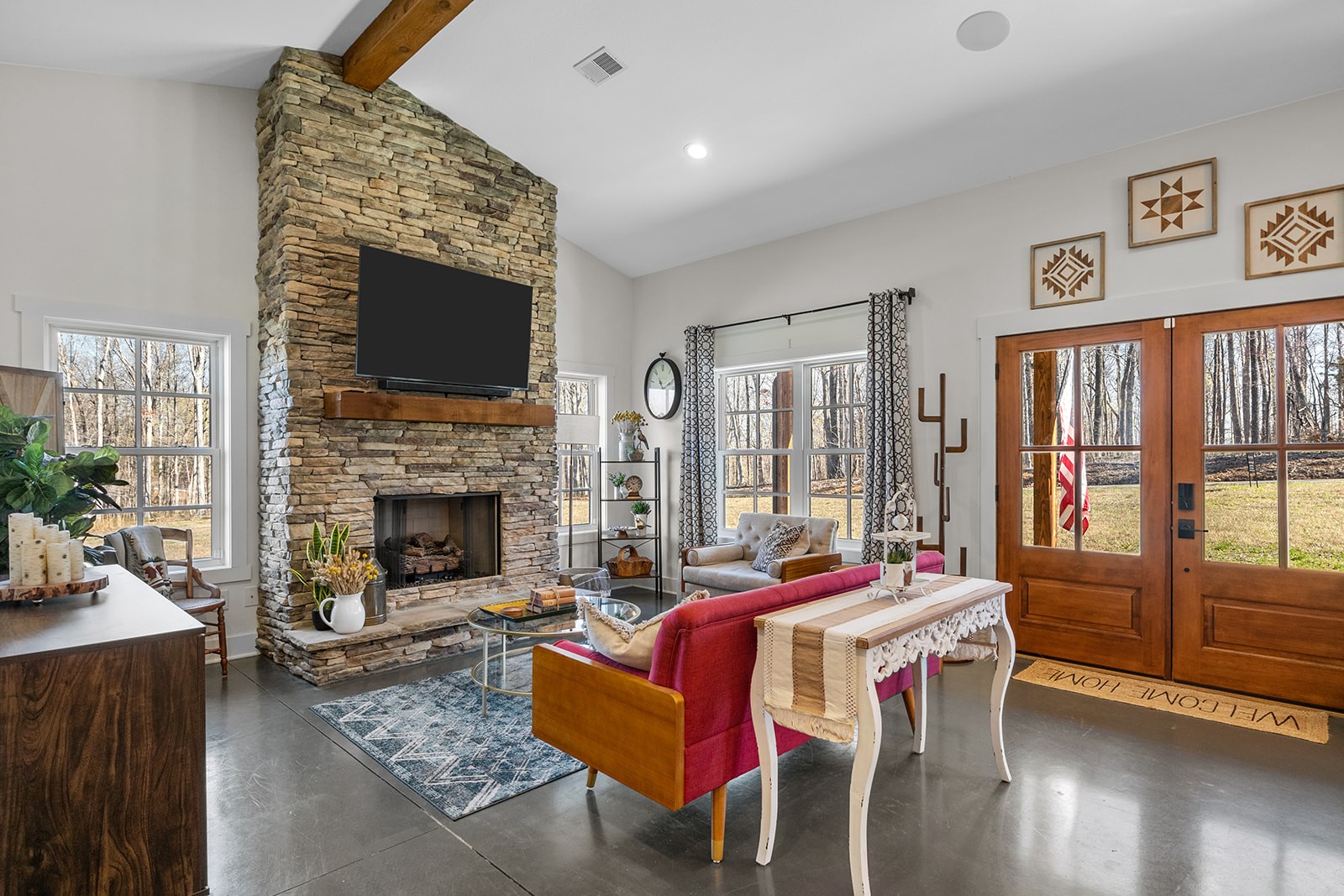 1319 Petty Road White Bluff, TN 37187 - Photo 11 of 45 a living room with furniture a flat screen tv and a fireplace
