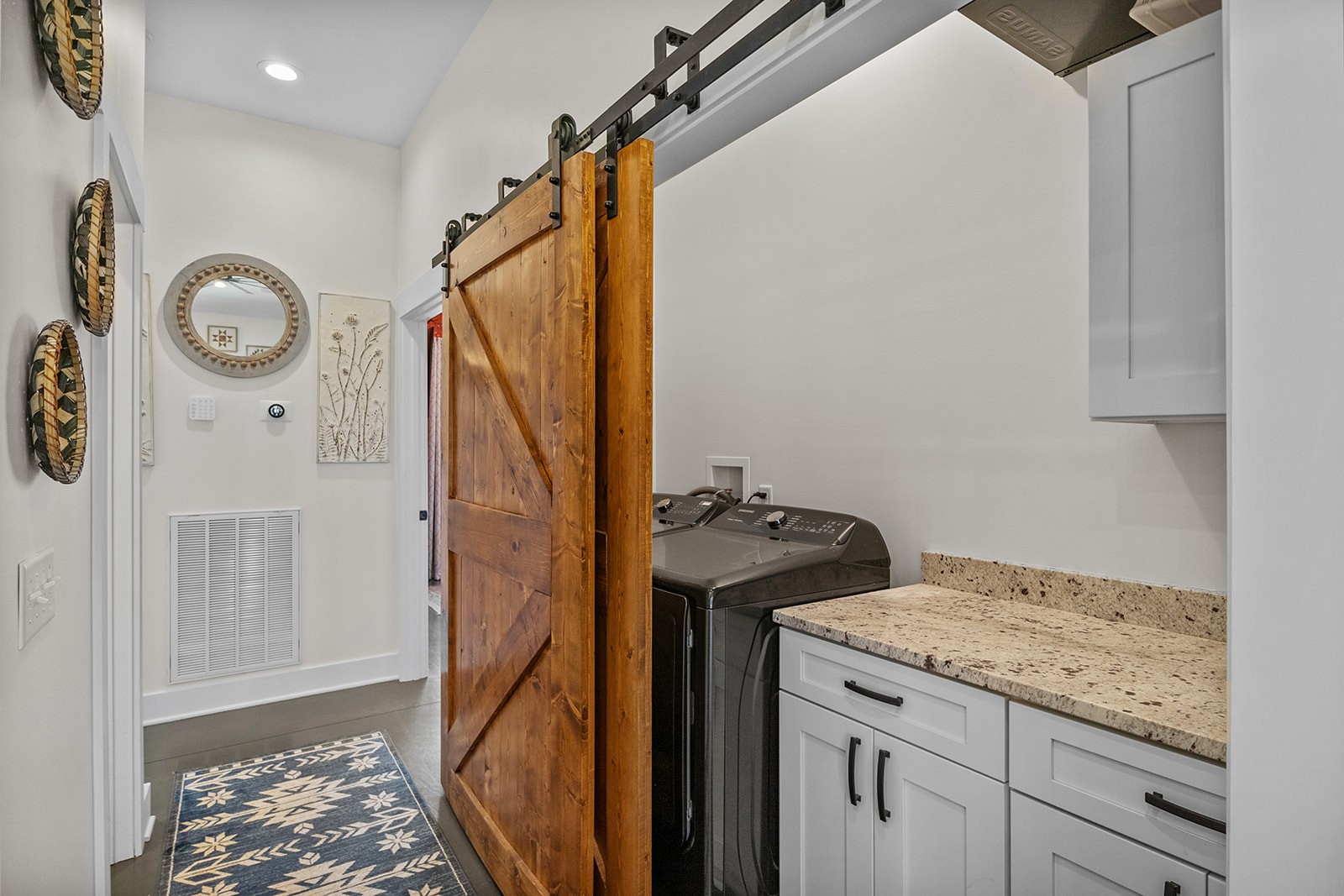 1319 Petty Road White Bluff, TN 37187 - Photo 13 of 45 a bathroom with a granite countertop sink and a mirror