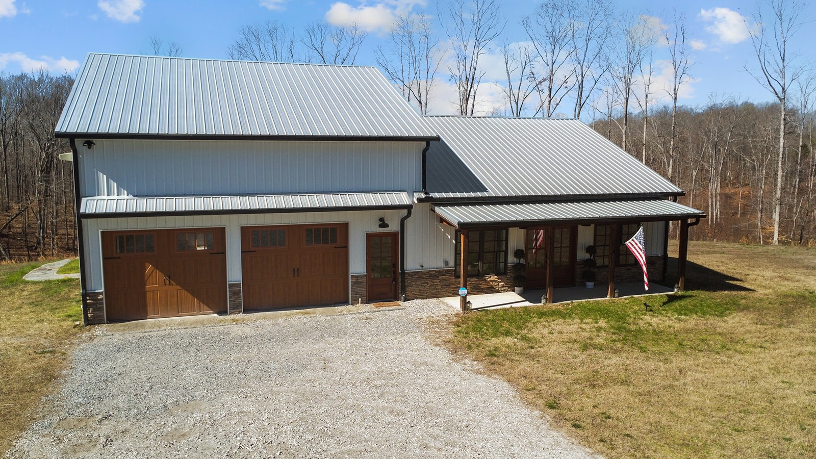 1319 Petty Road White Bluff, TN 37187 - Photo 33 of 45 a front view of a house with a yard and garage