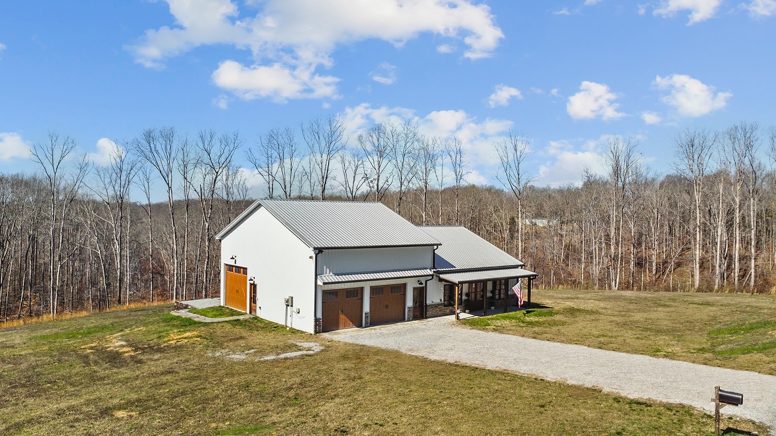1319 Petty Road White Bluff, TN 37187 - Photo 42 of 45 a front view of a house with a yard and garage