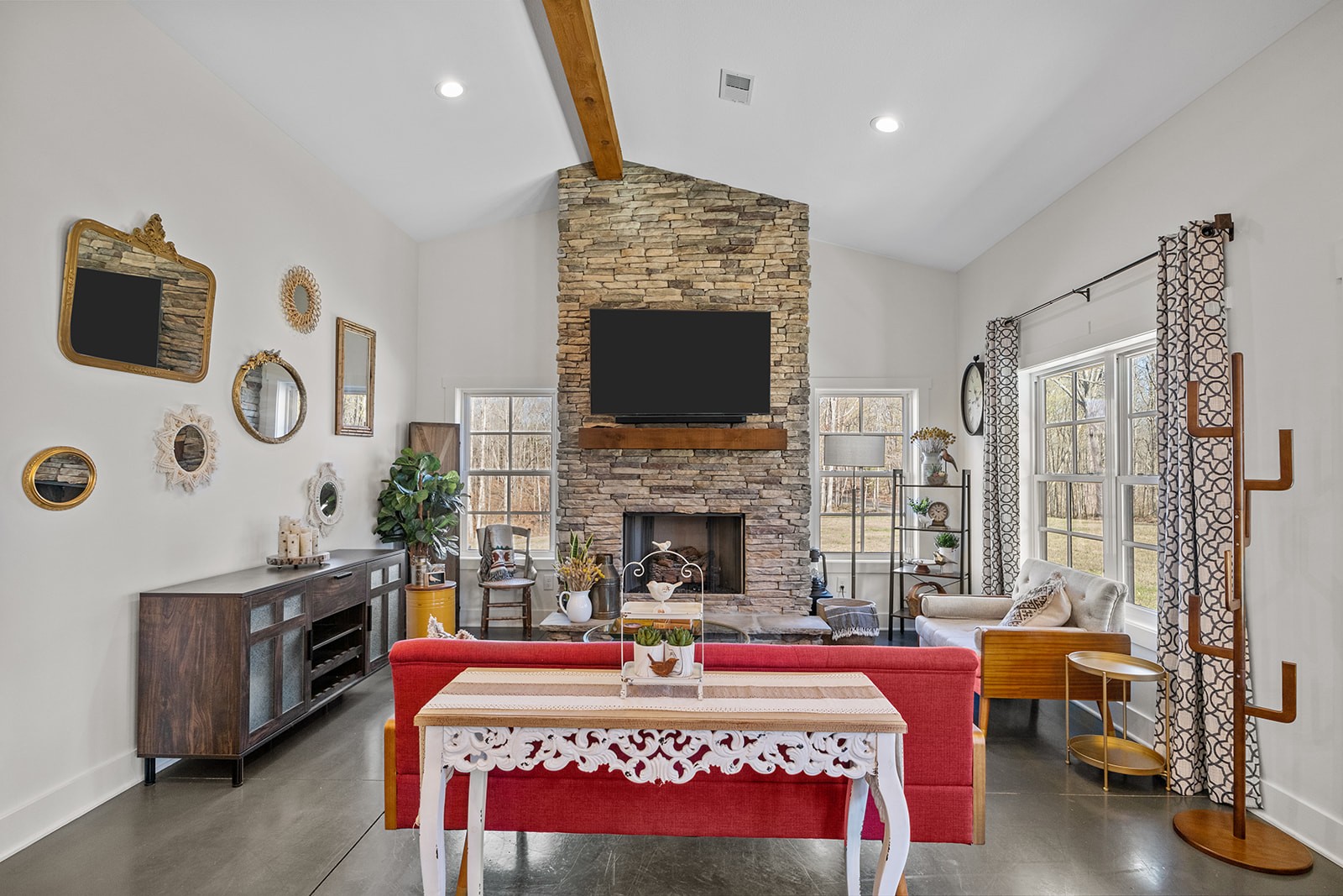 1319 Petty Road White Bluff, TN 37187 - Photo 9 of 45 a living room with furniture a flat screen tv and a fireplace