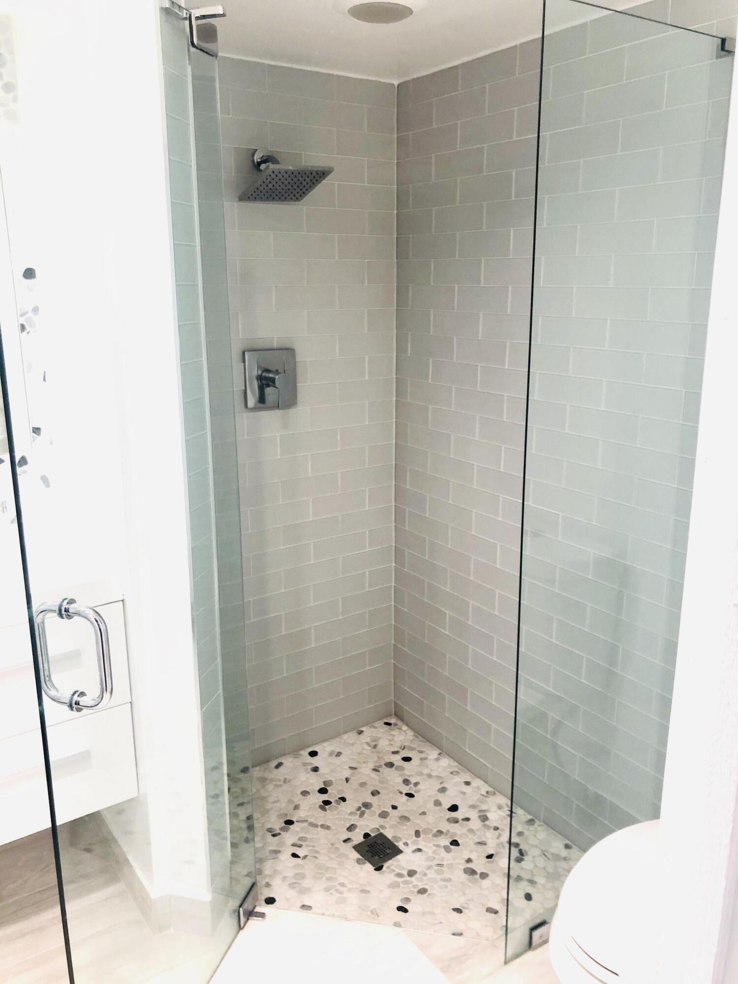 1111 Pepperridge Terrace Boca Raton, FL 33486 - Photo 5 of 8 a bathroom with a shower and a toilet