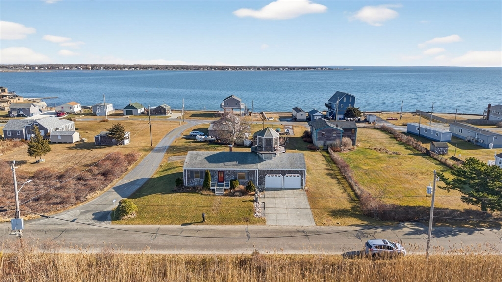 a view of a swimming pool with an ocean view