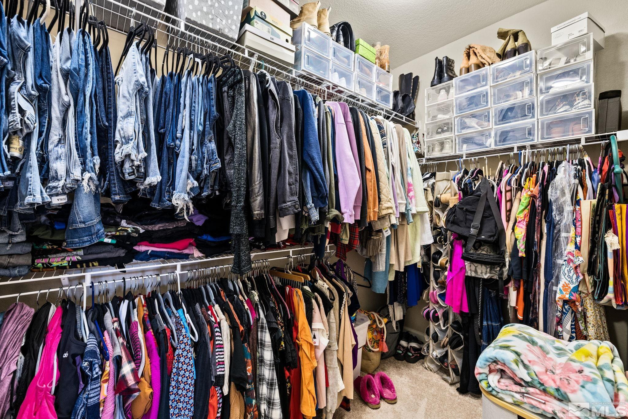 1735 Samantha Crest Trail Reno, NV 89523 - Photo 17 of 32 a view of walk in closet with clothes