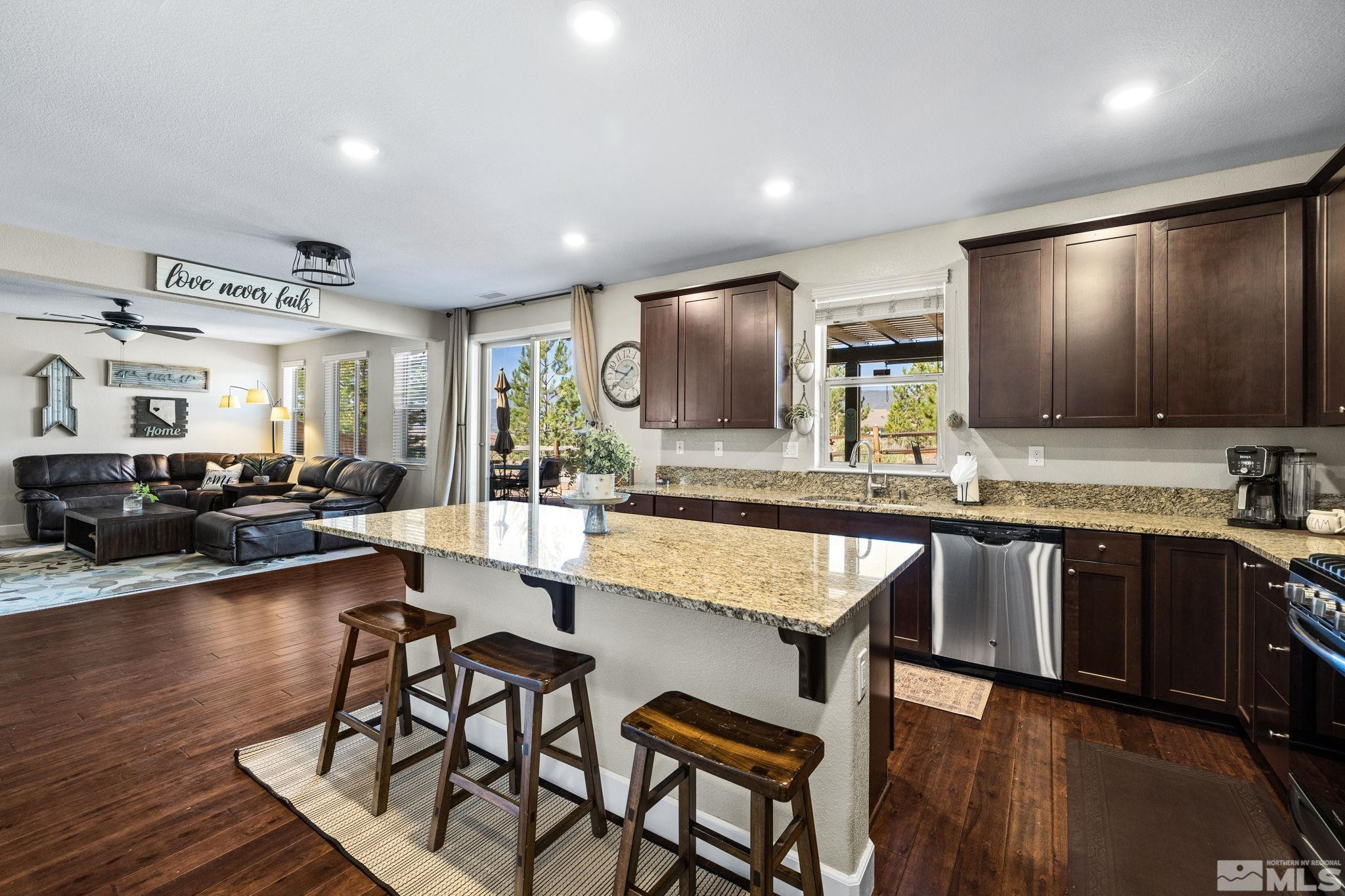 1735 Samantha Crest Trail Reno, NV 89523 - Photo 5 of 32 a large kitchen with lots of counter space a sink and appliances