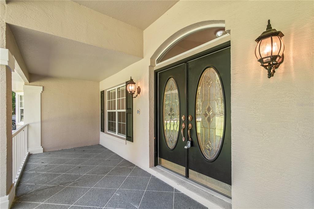 1969 Northwest 111th Loop Ocala, FL 34475 - Photo 15 of 48 a view of a entryway door of the house