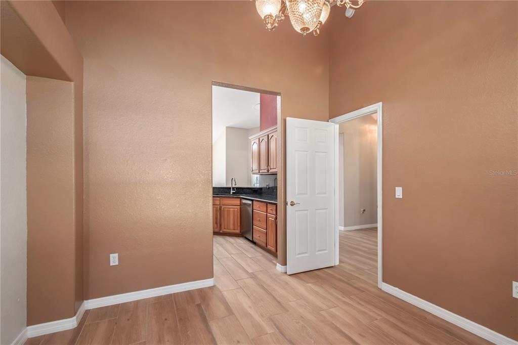 1969 Northwest 111th Loop Ocala, FL 34475 - Photo 24 of 48 a kitchen with stainless steel appliances granite countertop a refrigerator and a stove