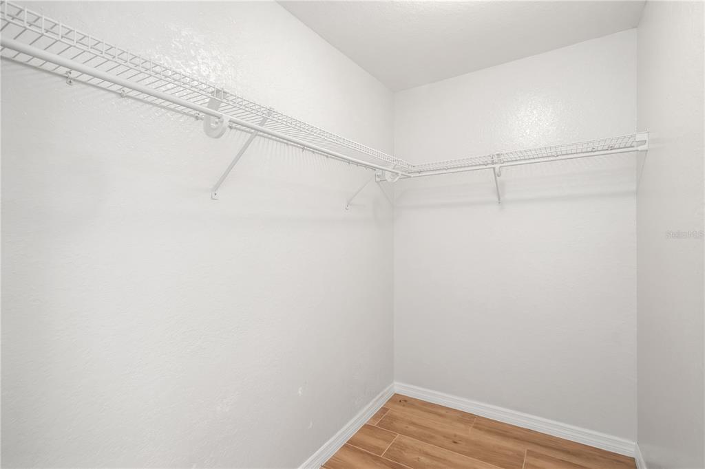 1969 Northwest 111th Loop Ocala, FL 34475 - Photo 26 of 48 a view of a room with racks on the wall