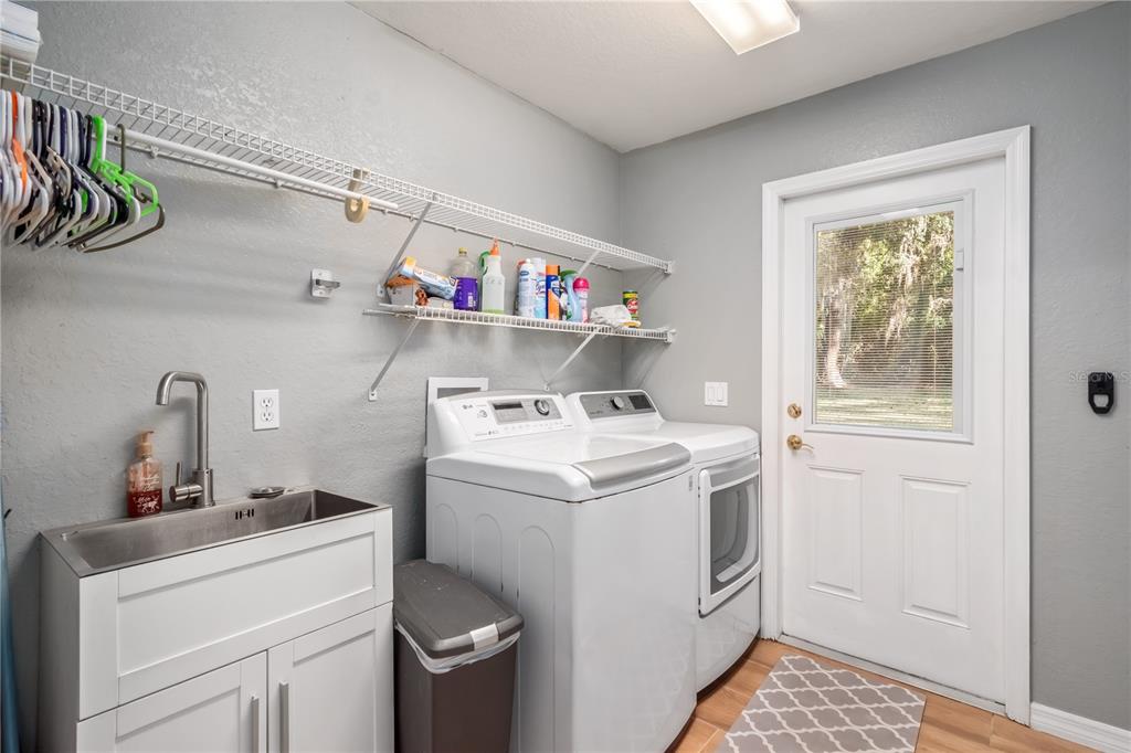 1969 Northwest 111th Loop Ocala, FL 34475 - Photo 33 of 48 a utility room with dryer and washer