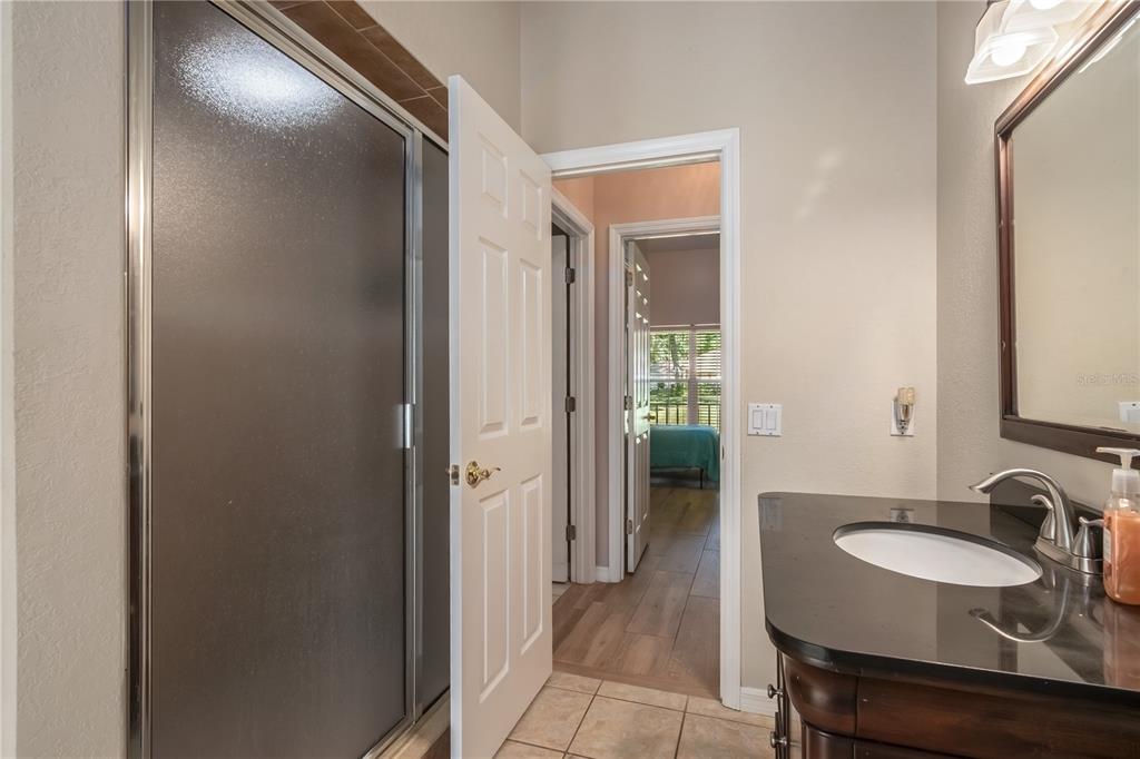 1969 Northwest 111th Loop Ocala, FL 34475 - Photo 35 of 48 a bathroom with a sink and a mirror