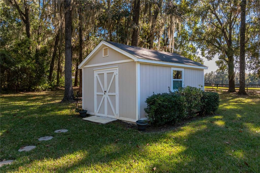 1969 Northwest 111th Loop Ocala, FL 34475 - Photo 5 of 48 a front view of house with yard and green space