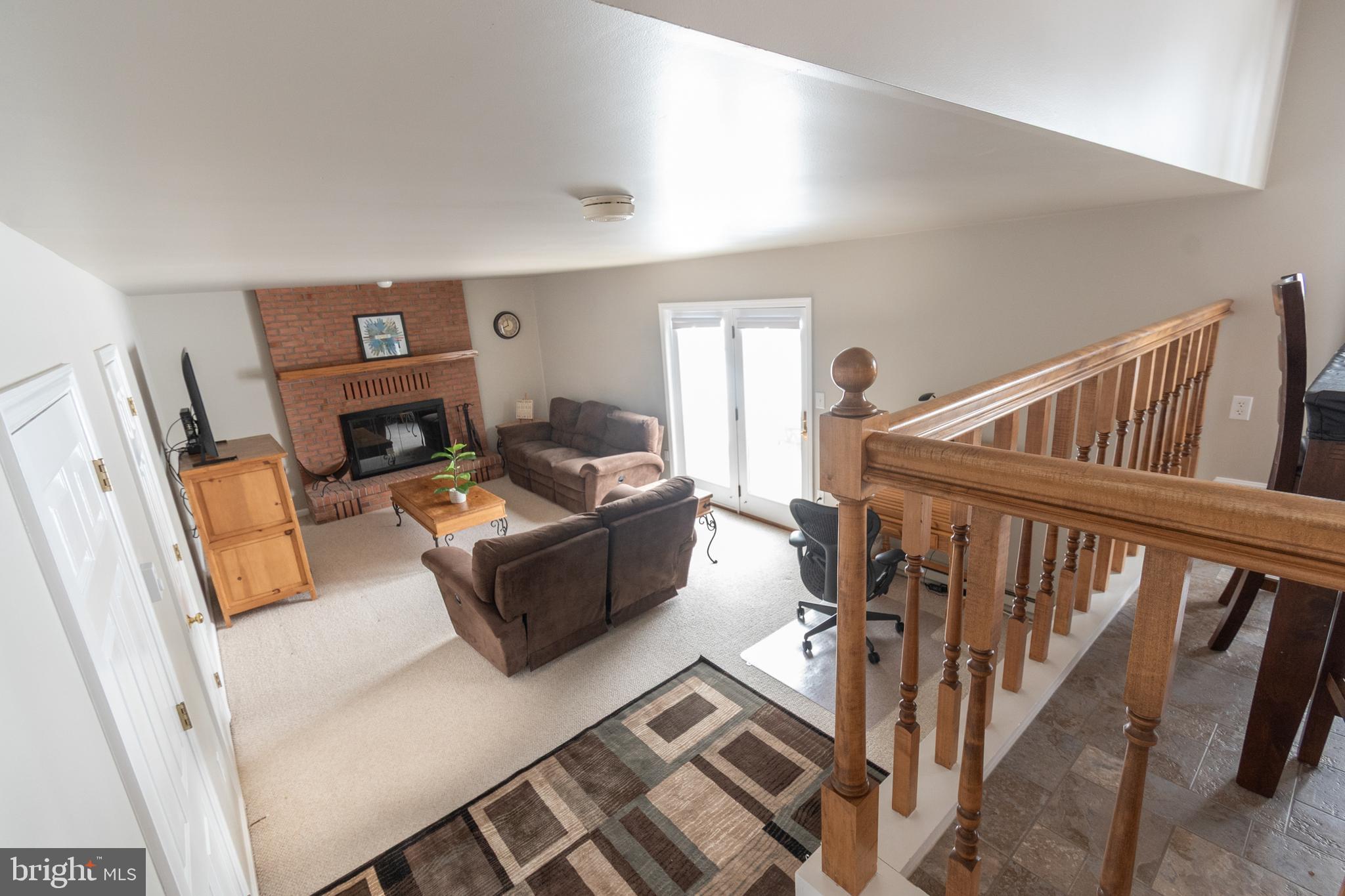 1469 Chaumont Avenue State College, PA 16801 - Photo 13 of 50 a living room with furniture and a flat screen tv