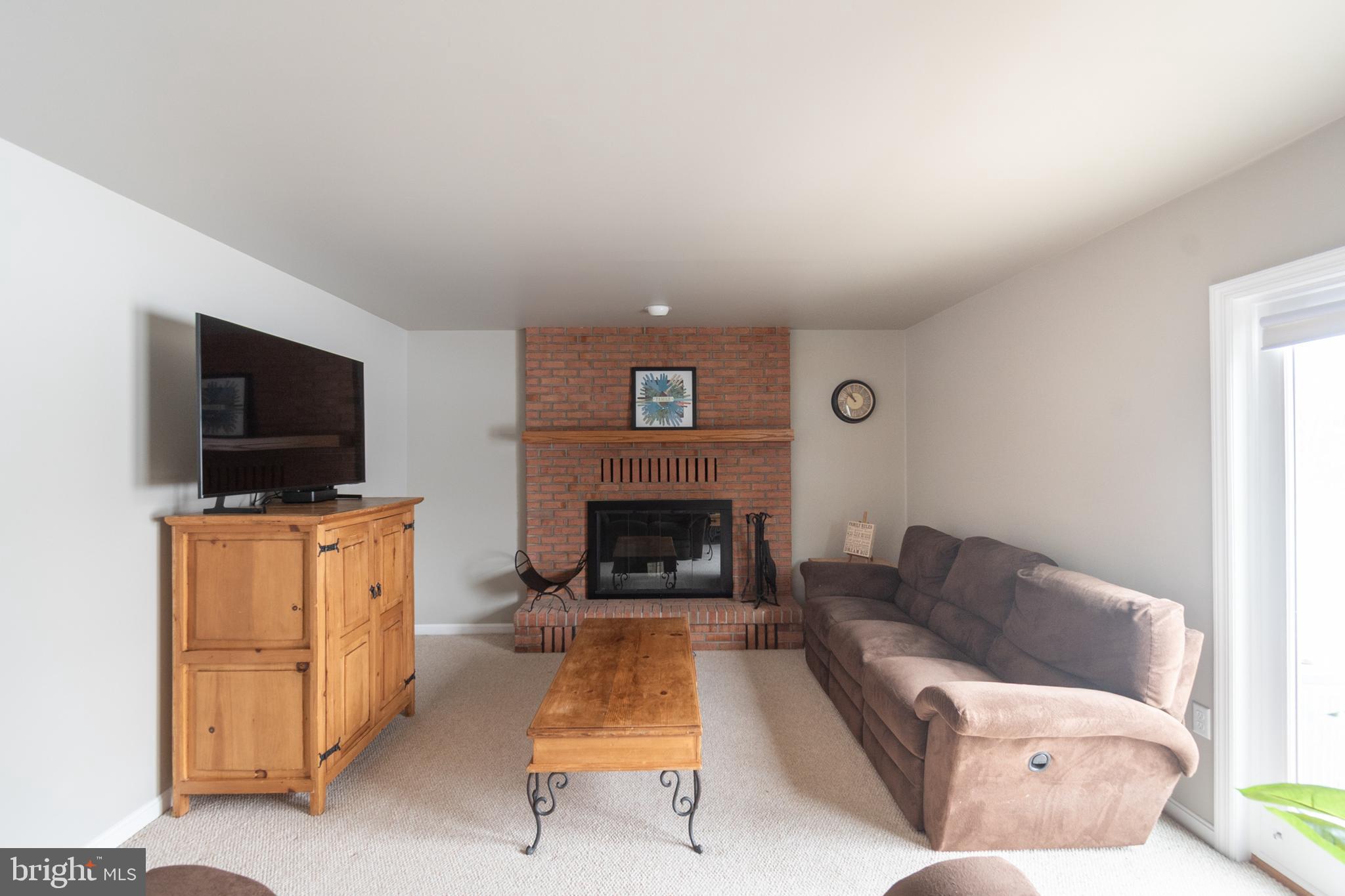1469 Chaumont Avenue State College, PA 16801 - Photo 16 of 50 a living room with furniture and a flat screen tv