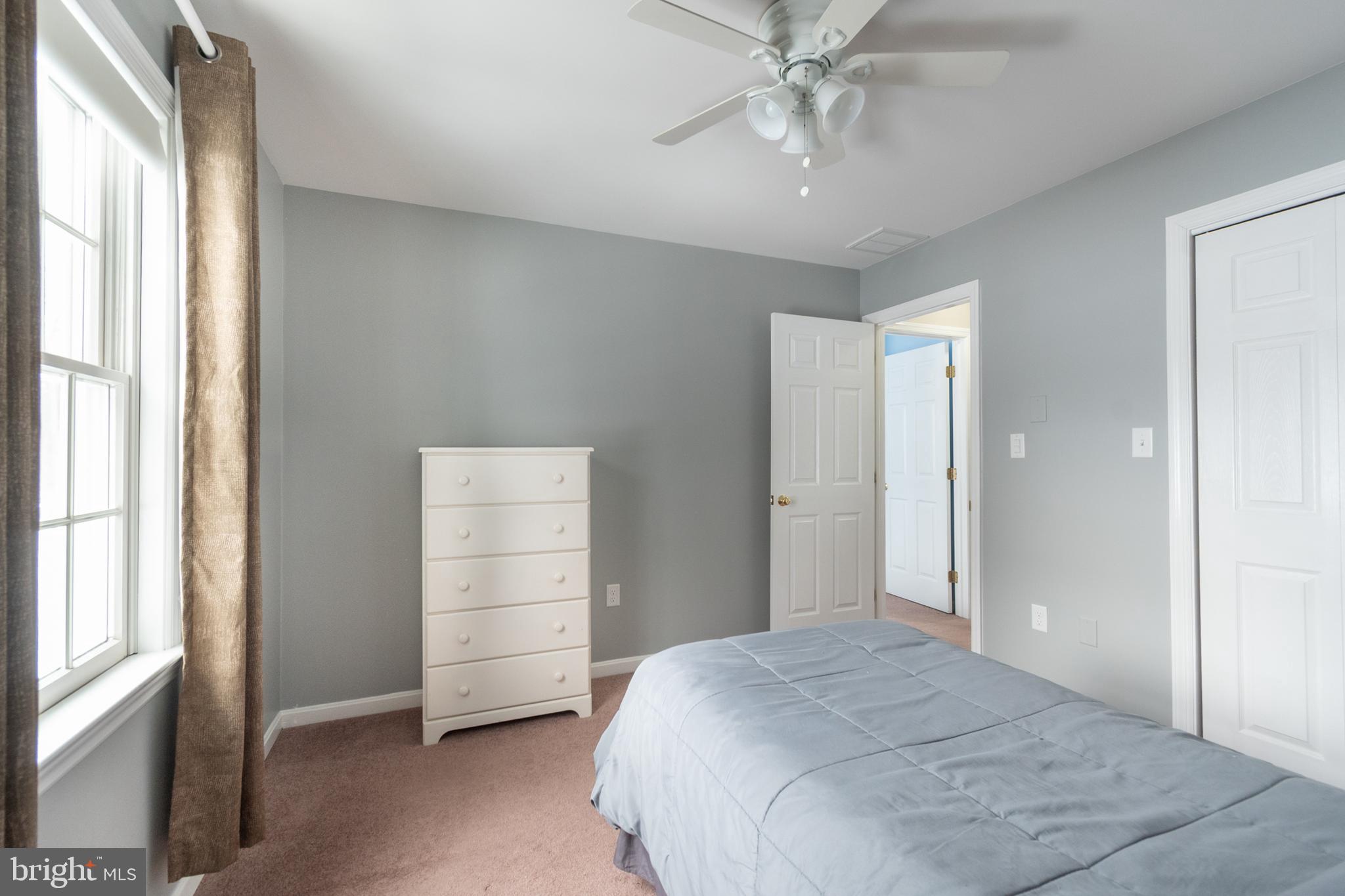 1469 Chaumont Avenue State College, PA 16801 - Photo 35 of 50 a bedroom with a bed and a window