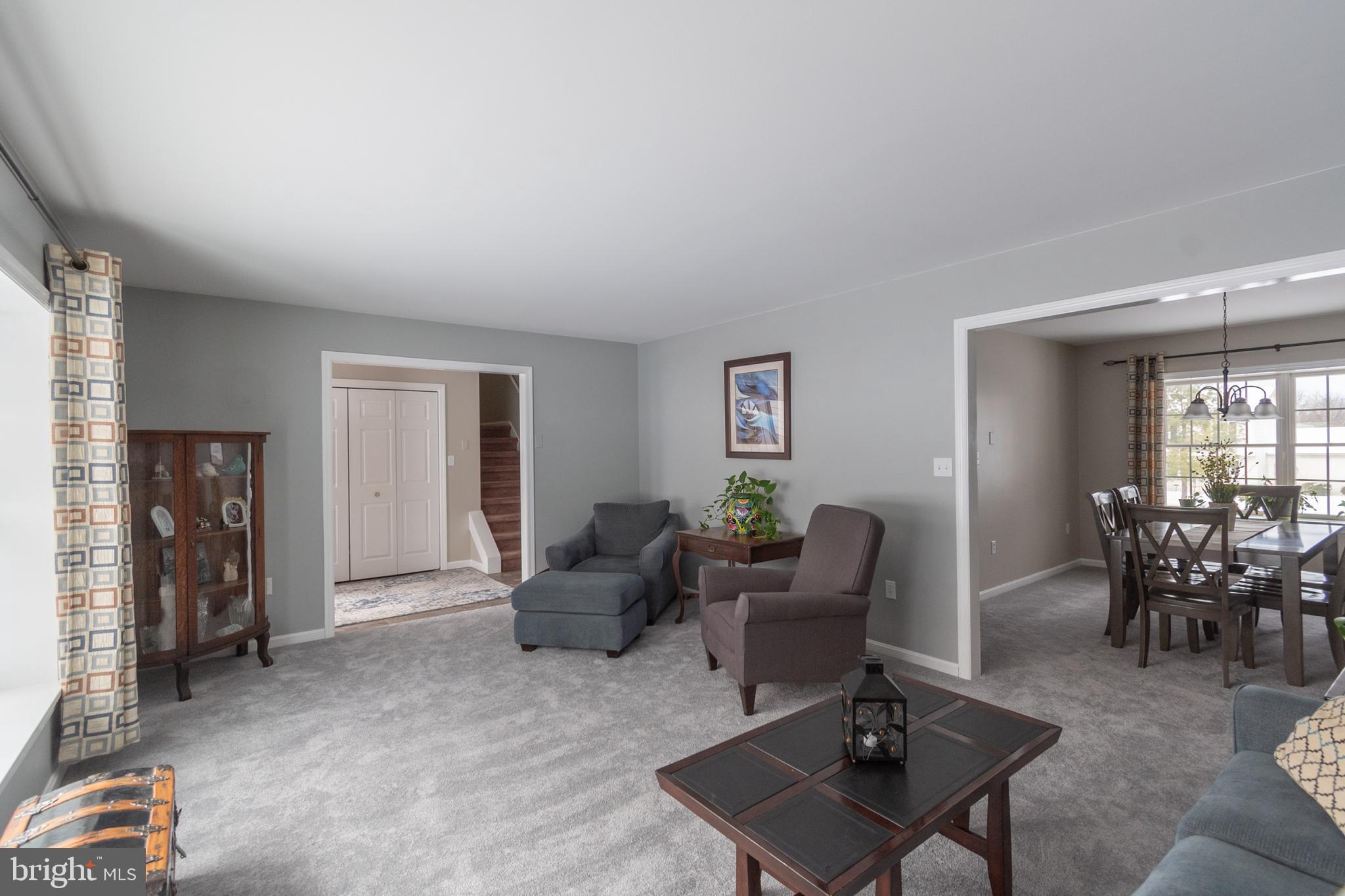 1469 Chaumont Avenue State College, PA 16801 - Photo 6 of 50 a living room with furniture a rug and a window