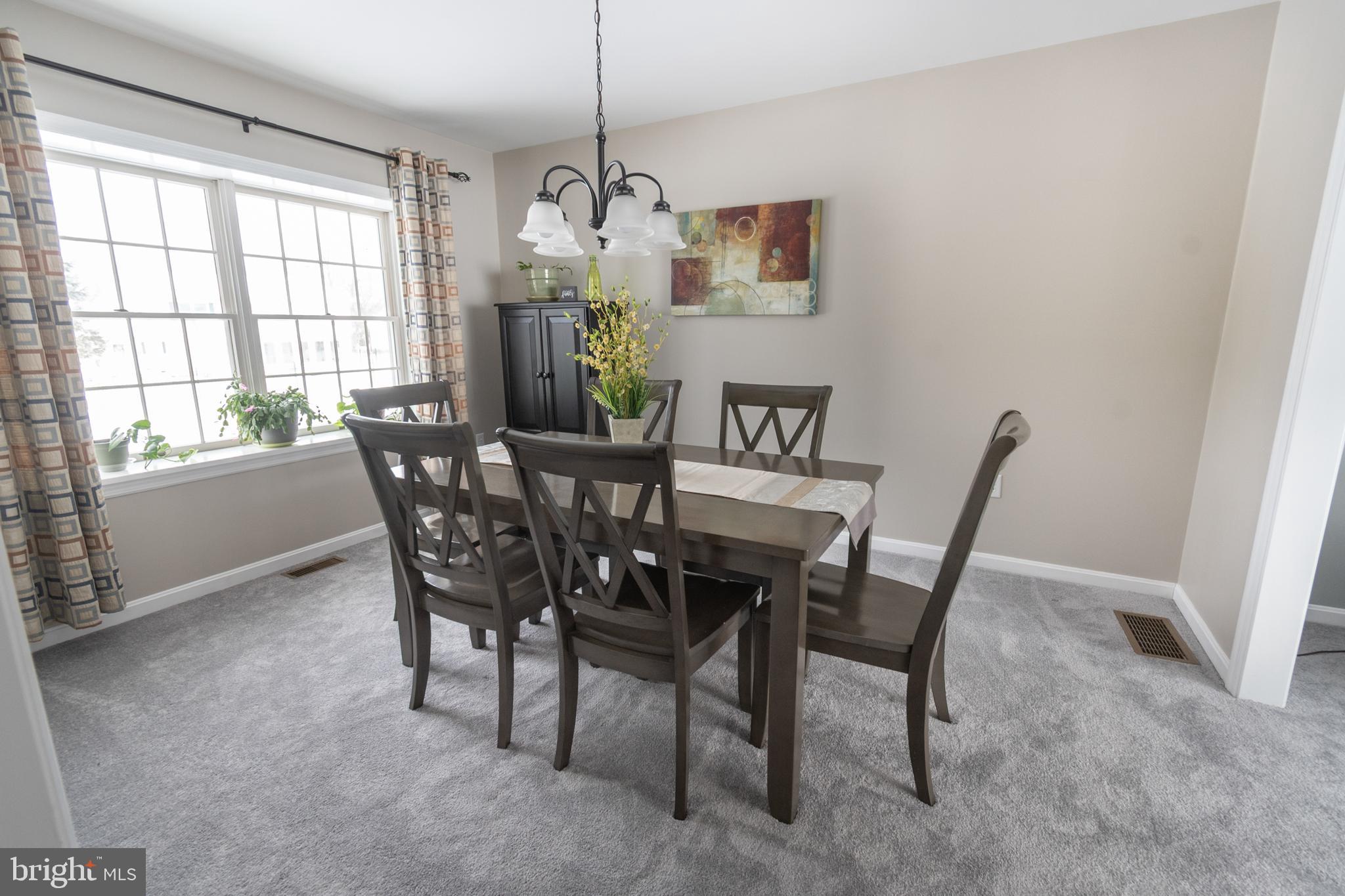 1469 Chaumont Avenue State College, PA 16801 - Photo 7 of 50 a view of a dining room with furniture window and outside view