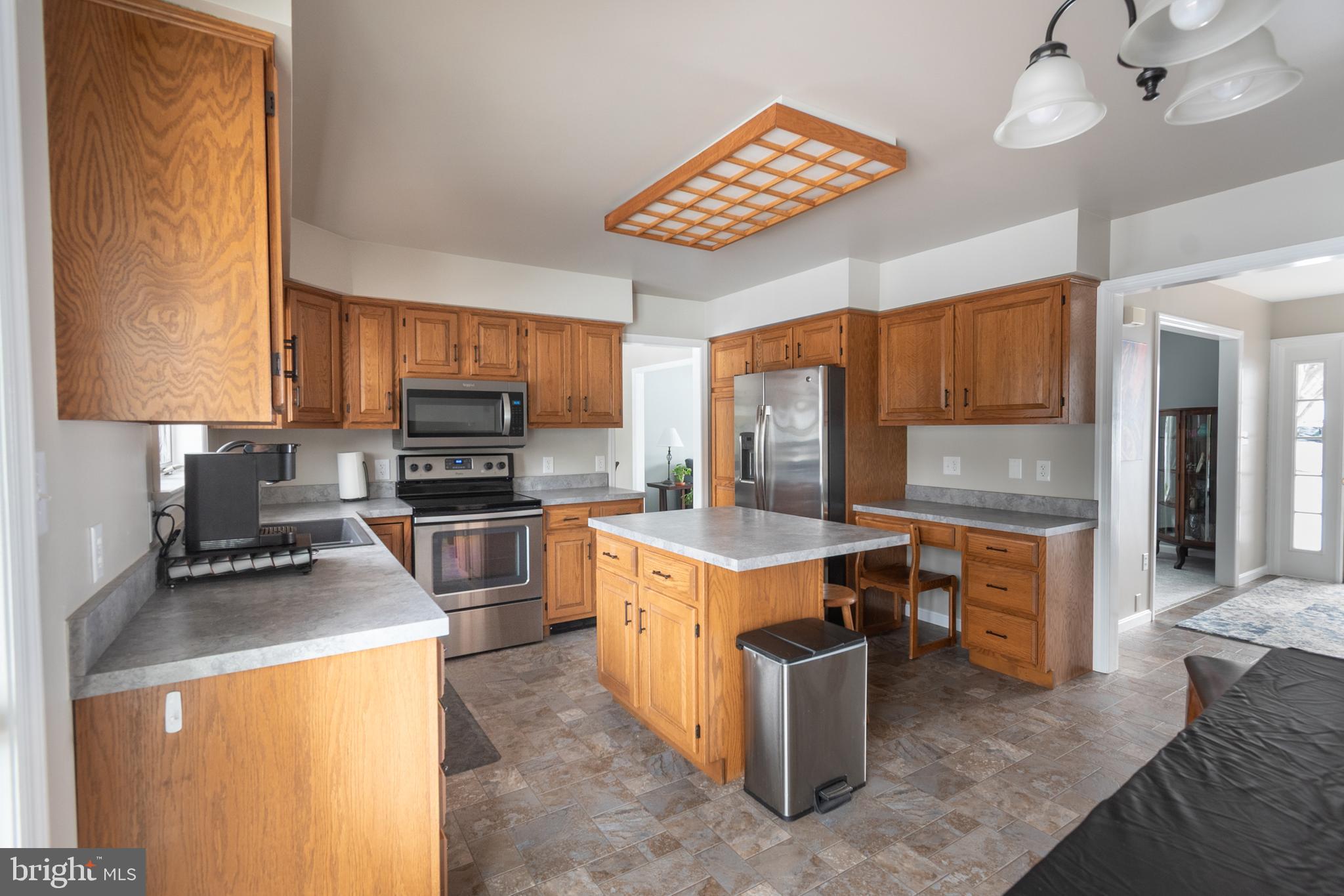 1469 Chaumont Avenue State College, PA 16801 - Photo 10 of 50 a kitchen with a refrigerator stove and microwave