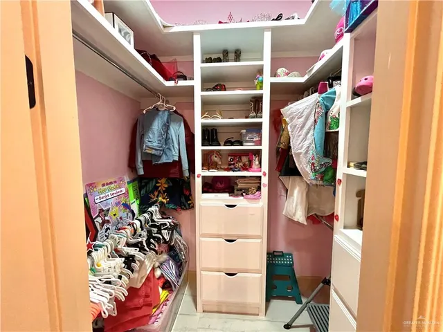 a kitchen that has a sink and a stove