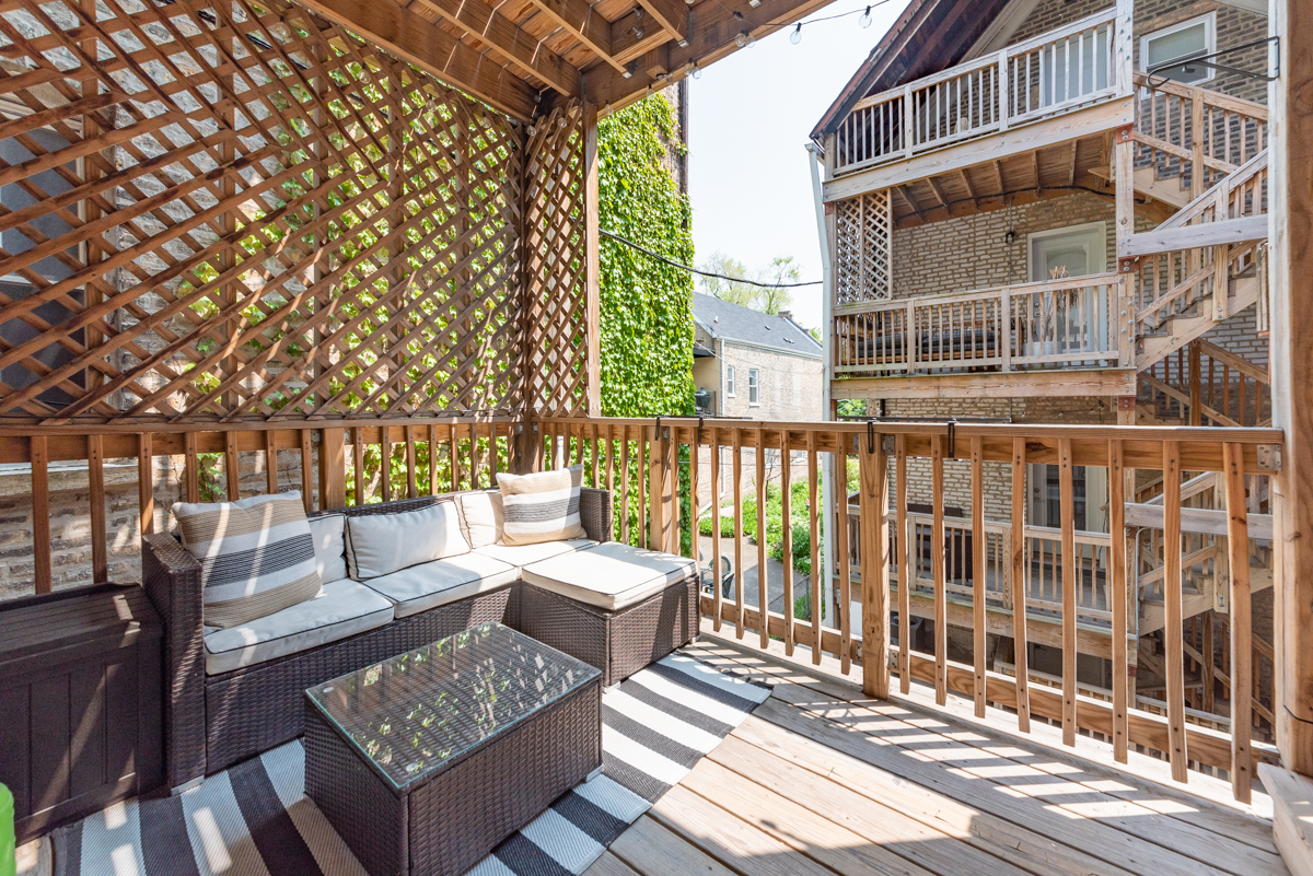 2145 West Webster Avenue, Unit 2 Chicago, IL 60647 - Photo 13 of 13 a building outdoor space with patio furniture