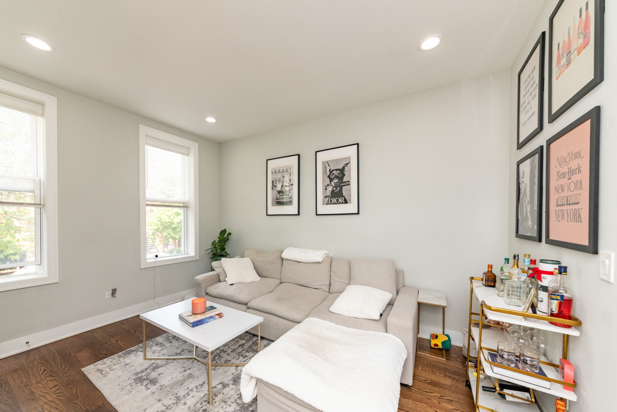 2145 West Webster Avenue, Unit 2 Chicago, IL 60647 - Photo 5 of 13 a living room with furniture and a window
