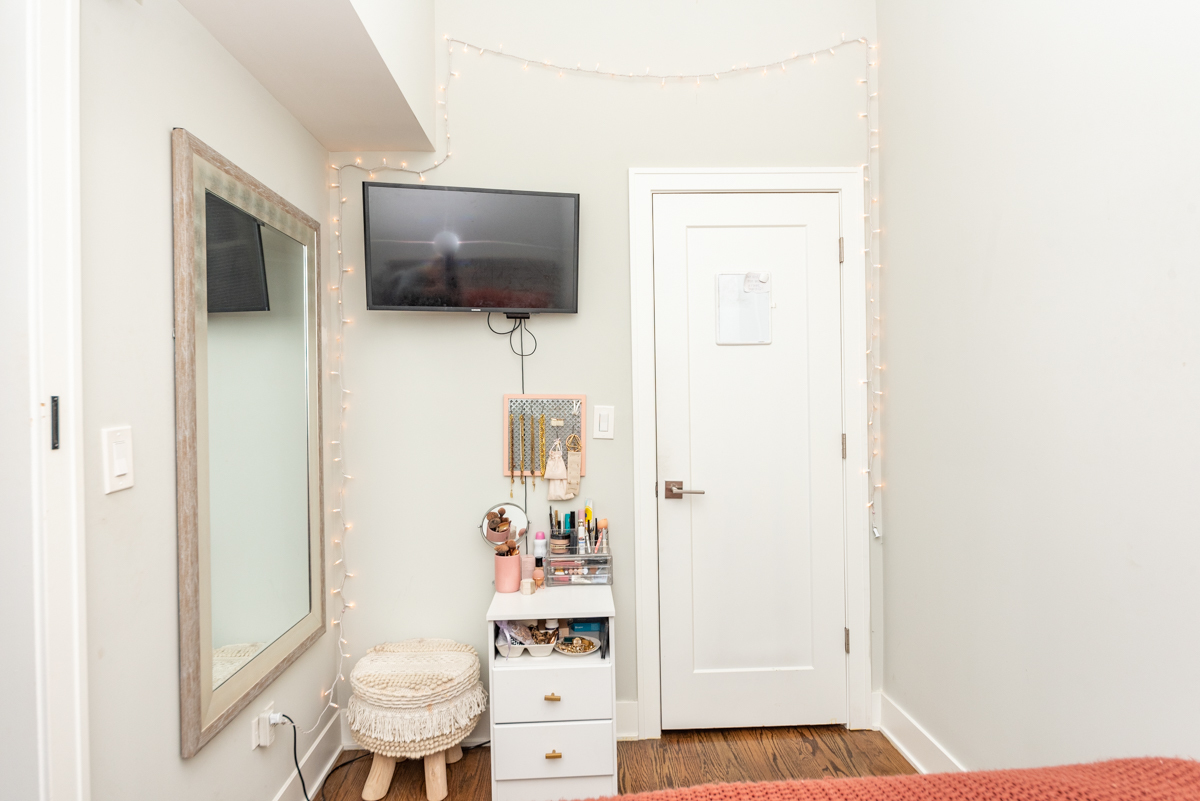 2145 West Webster Avenue, Unit 2 Chicago, IL 60647 - Photo 10 of 13 a living room with furniture and a flat screen tv
