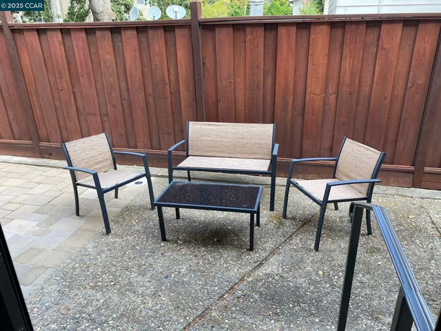 a view of outdoor space with lounge chair
