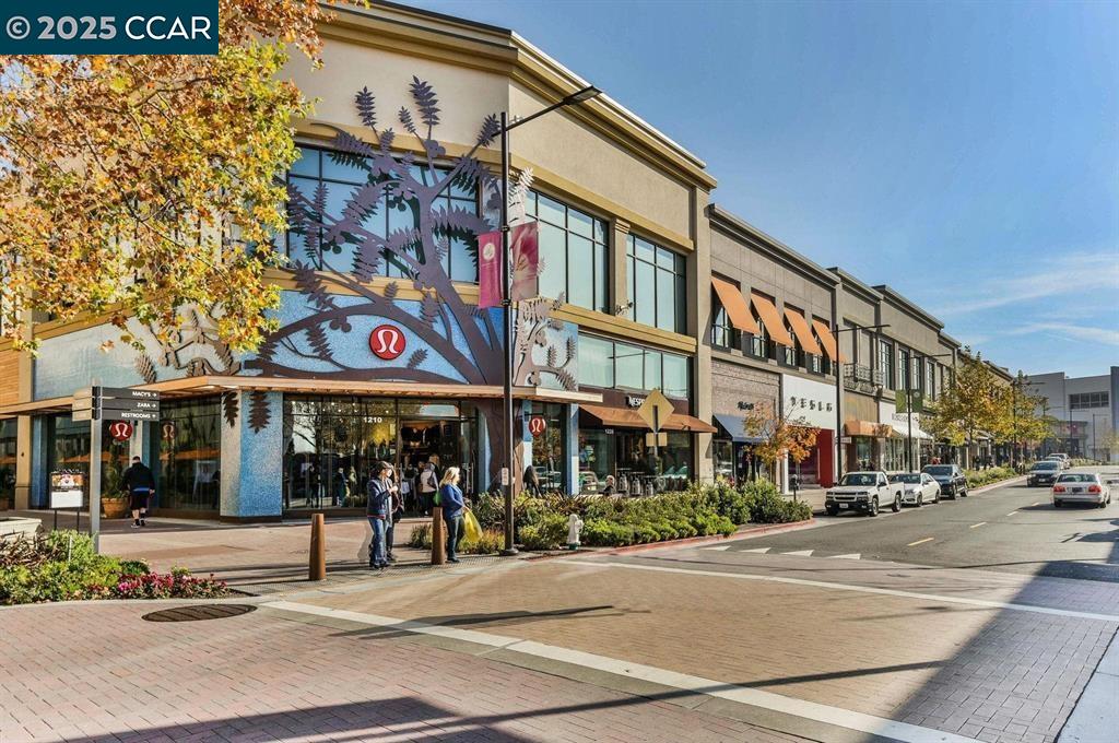 1220 Walker Avenue, Unit 3 Walnut Creek, CA 94596 - Photo 21 of 26 a view of street with building and traffic signal