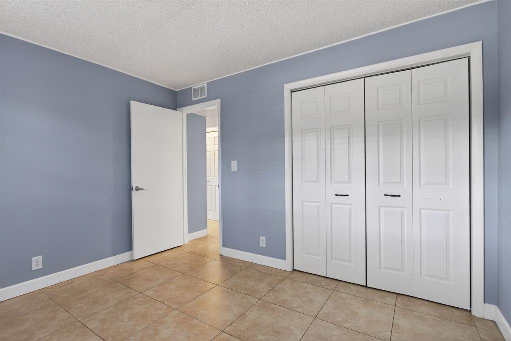 1759 Northeast 40th Place, Unit 604 Pompano Beach, FL 33064 - Photo 16 of 24 a view of an empty room