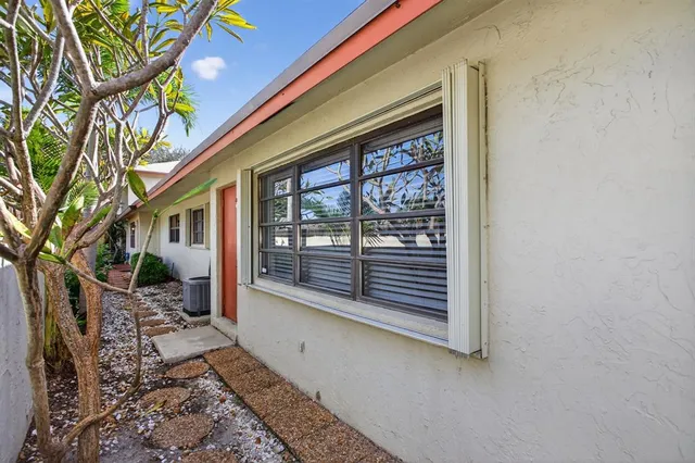 a house with trees in front of it