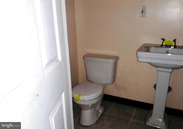 500 Blick Drive Silver Spring, MD 20904 - Photo 9 of 15 a white toilet sitting next to a sink