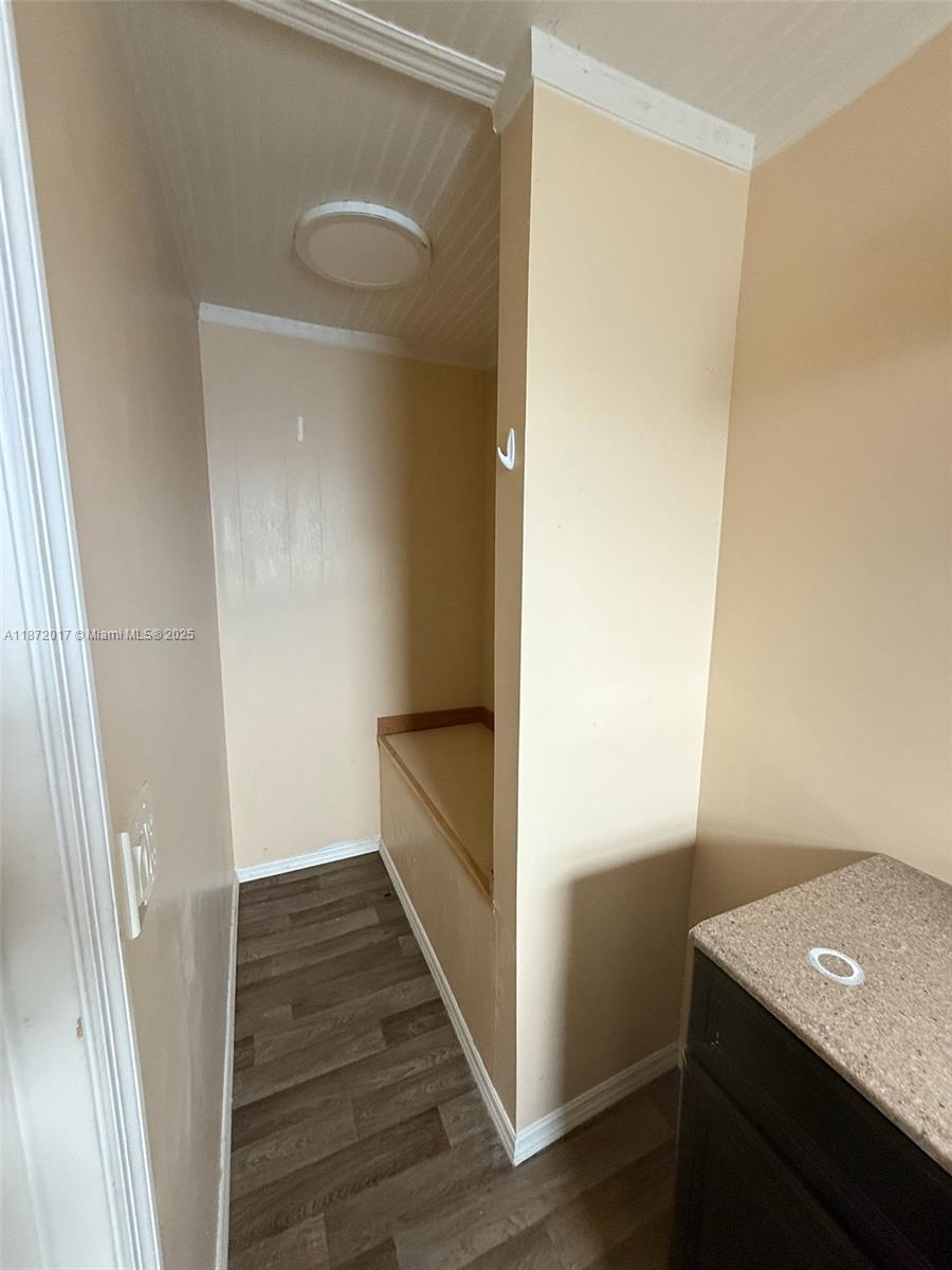 5374 Southeast Celestial Circle Stuart, FL 34997 - Photo 12 of 23 a view of a hallway with wooden floor