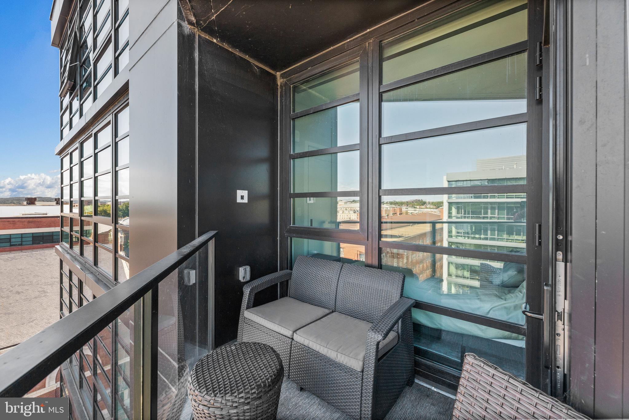 1300 4th Street Southeast, Unit 915 Washington, DC 20003 - Photo 19 of 34 a balcony view with a couch