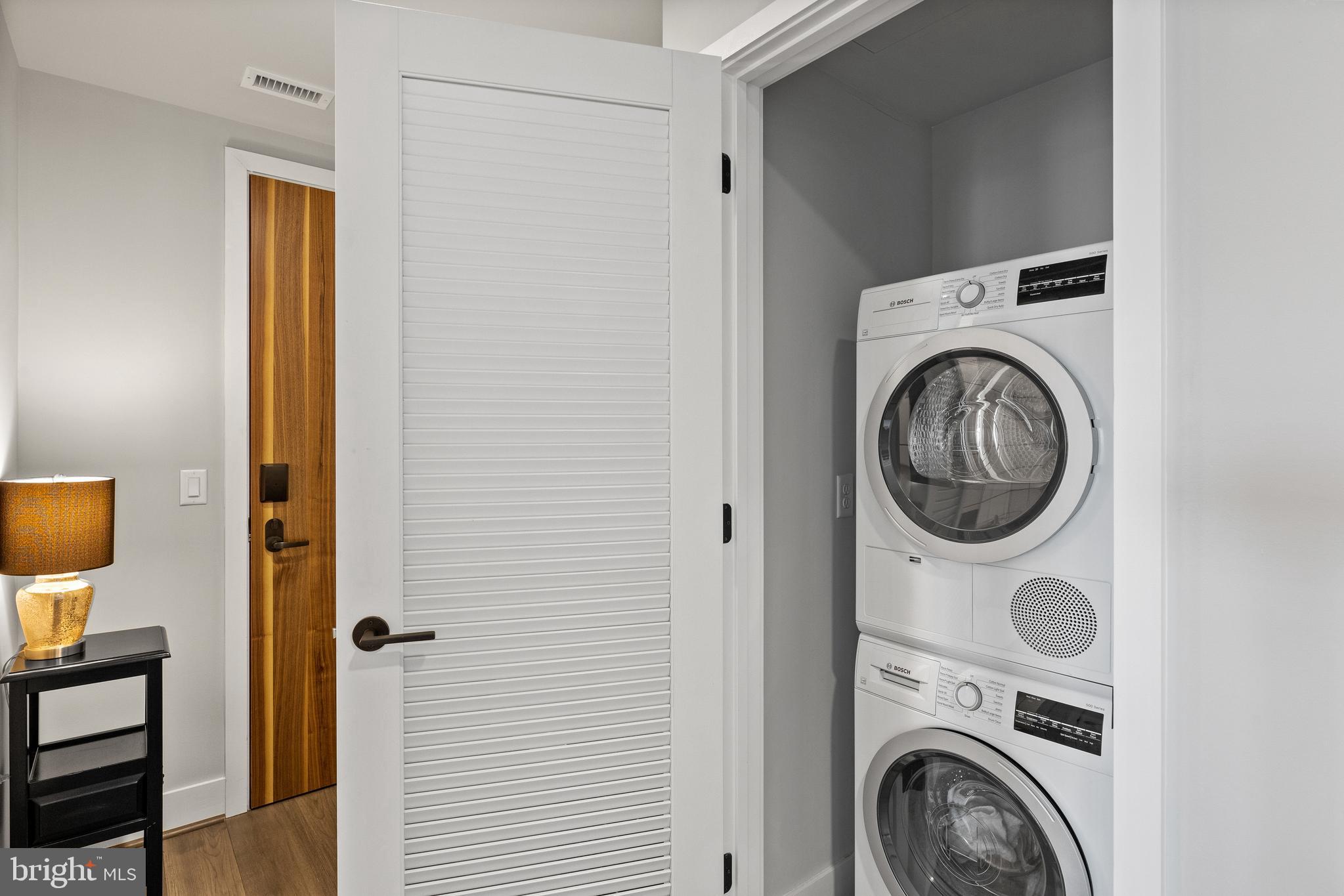 1300 4th Street Southeast, Unit 915 Washington, DC 20003 - Photo 21 of 34 a view of bathroom with washer and dryer