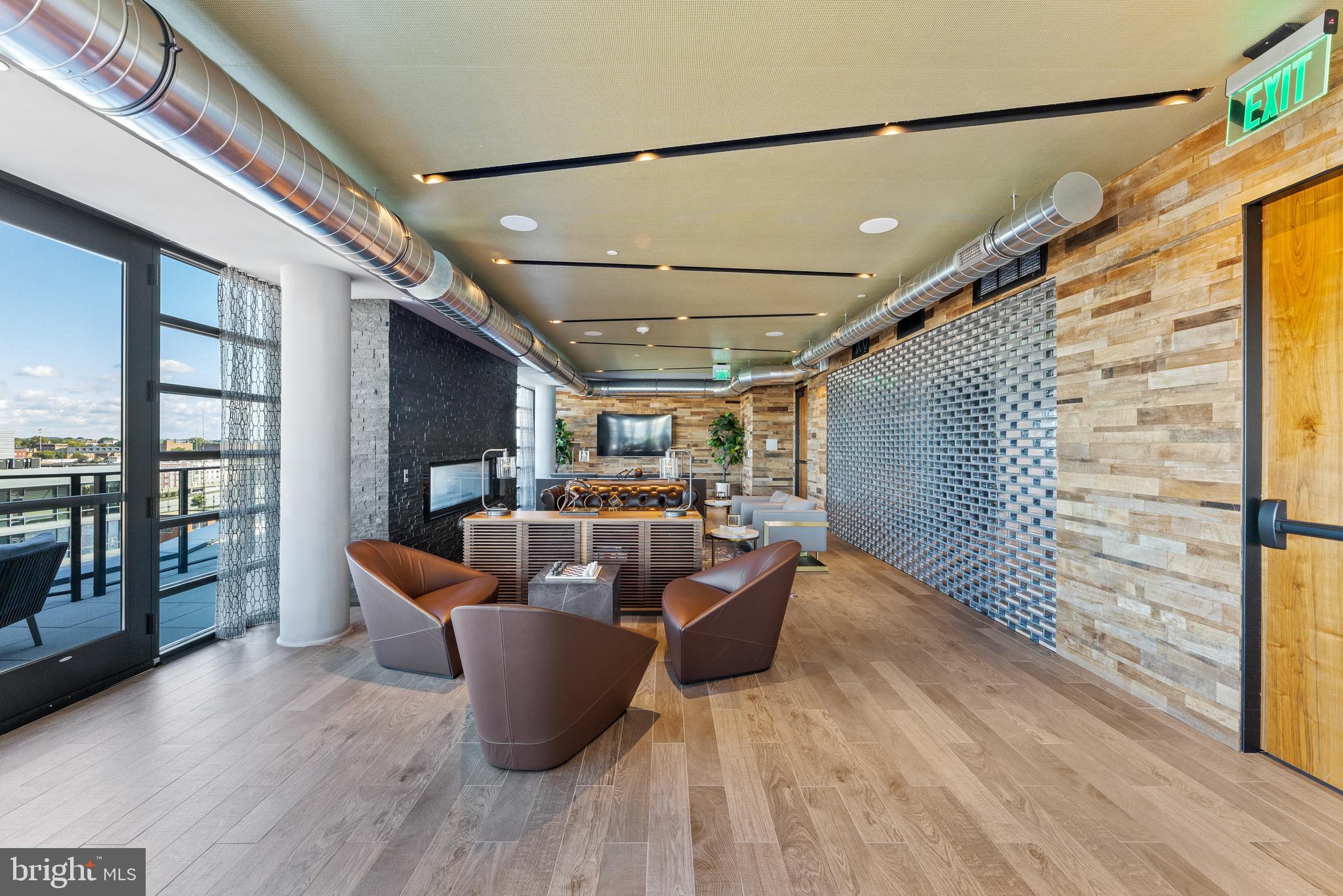 1300 4th Street Southeast, Unit 915 Washington, DC 20003 - Photo 24 of 34 a outdoor living space with furniture and a floor to ceiling window