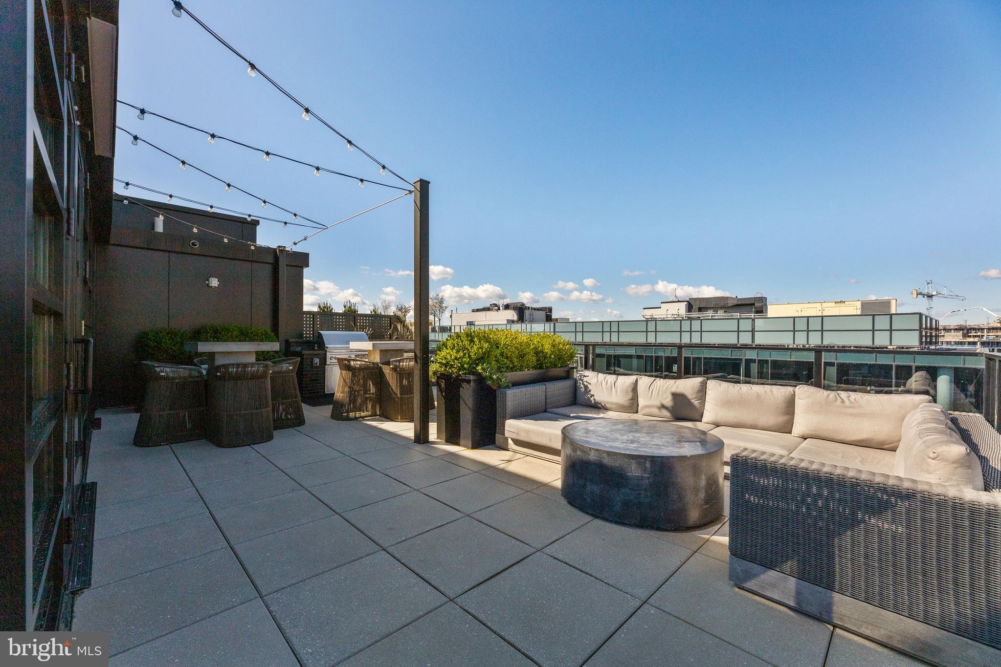 1300 4th Street Southeast, Unit 915 Washington, DC 20003 - Photo 27 of 34 a view of roof deck with patio