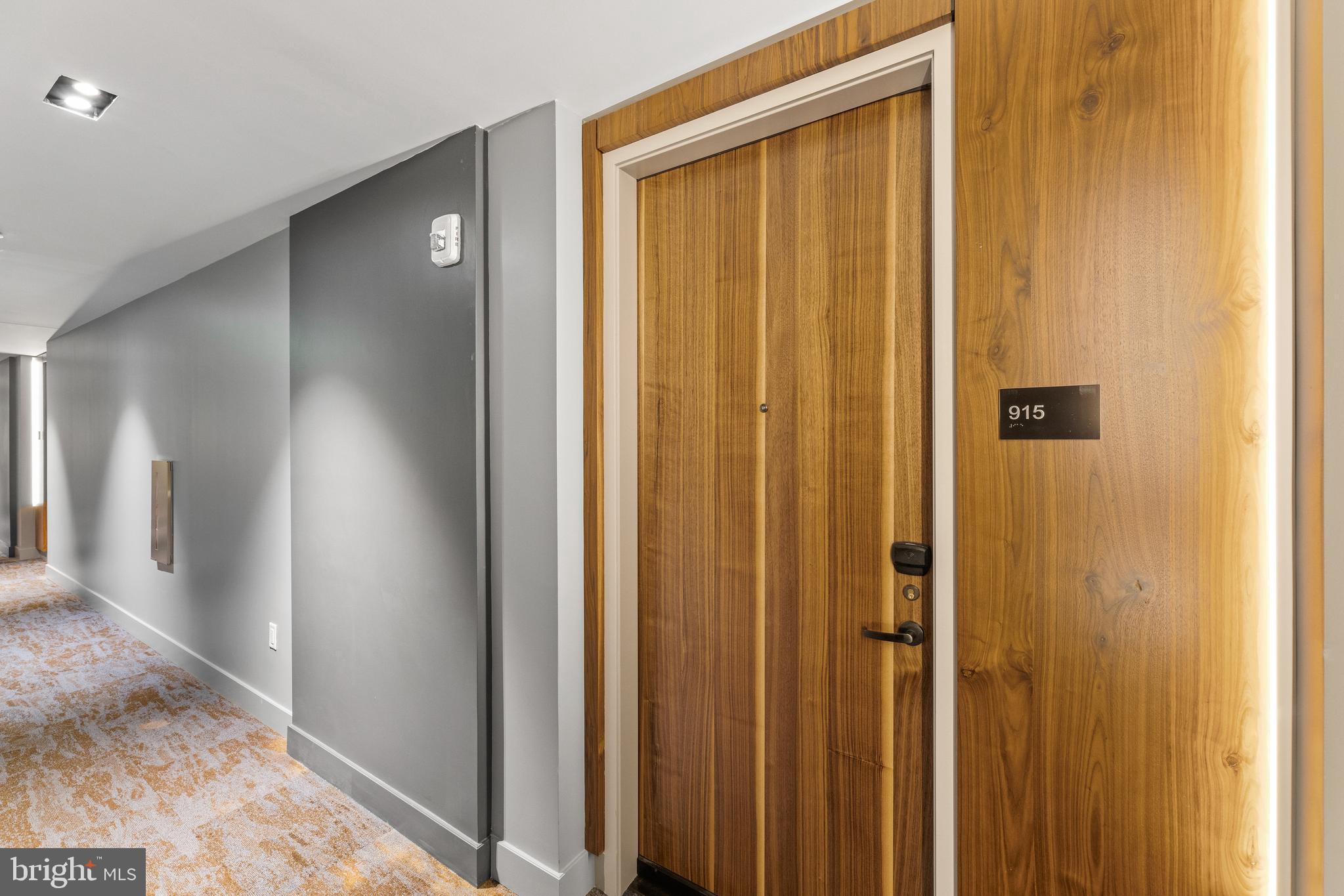 1300 4th Street Southeast, Unit 915 Washington, DC 20003 - Photo 31 of 34 a view of a hallway with a elevator