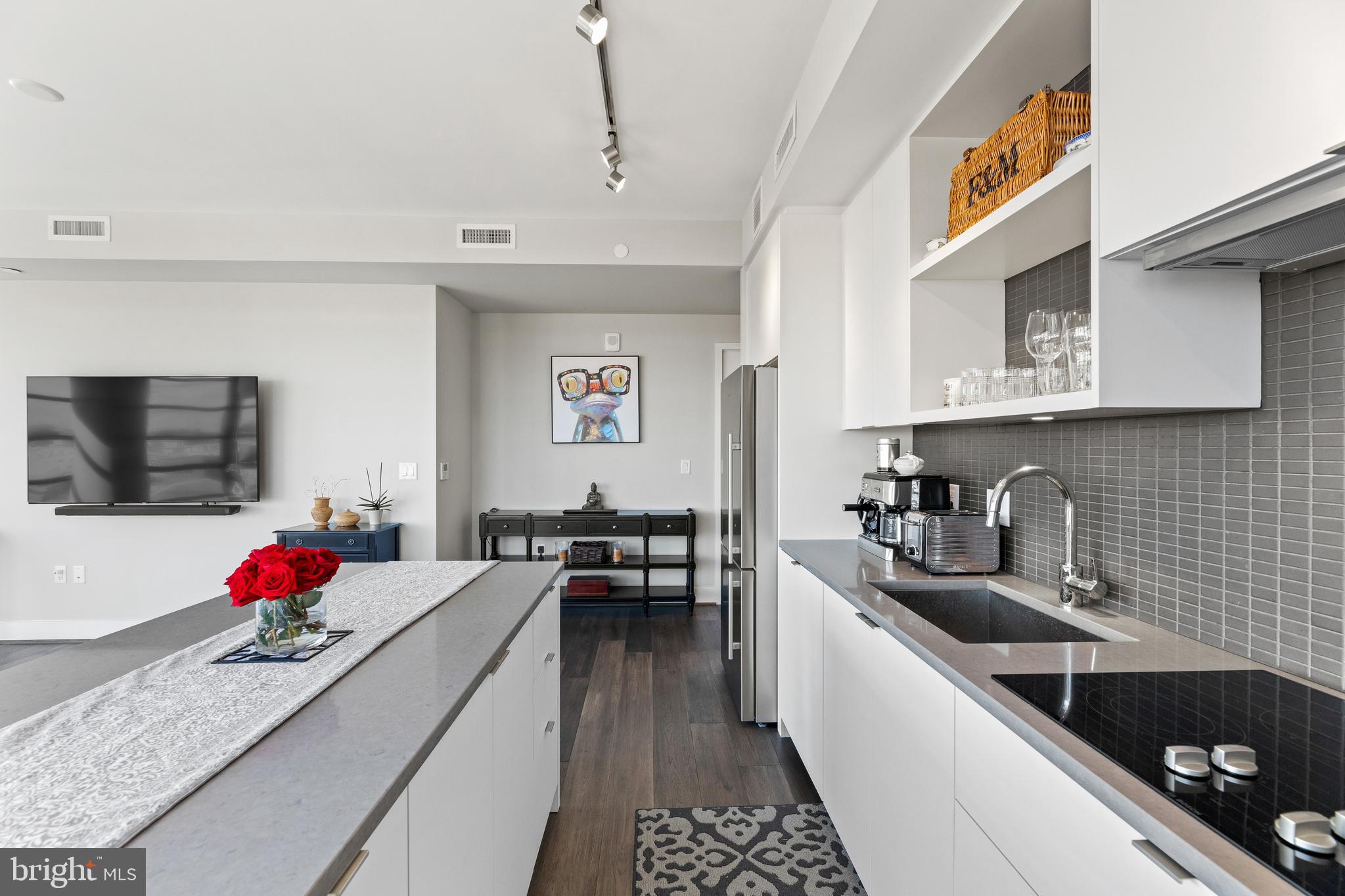 1300 4th Street Southeast, Unit 915 Washington, DC 20003 - Photo 6 of 34 a kitchen with granite countertop lots of counter top space